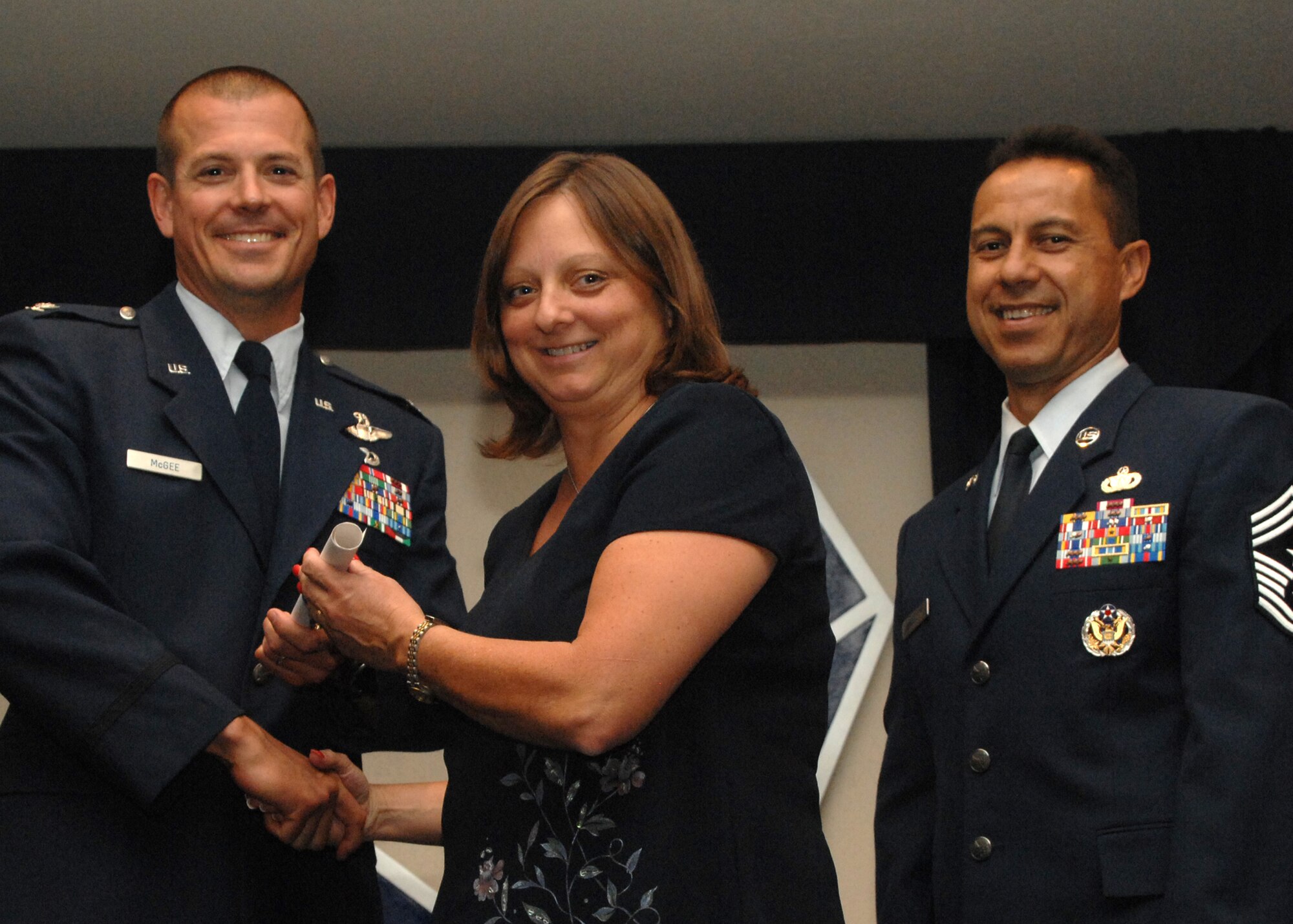 Holloman Air Force Base honors volunteers during the annual Volunteer Recognition Ceremony, June 27 at the Desert Sands Enlisted Club Holloman at Air Force Base, N.M. The ceremony is held to recognize those who volunteered between April 2007 and April 2008. This year the volunteers contributed more than 24,350 hours, which would equate to $158,321,00 if working for minimum wage. The Volunteers spent time at various places and events toinclude; the Holloman AFB Chapel, medical group, Boys and Girls Scouts, Thrift Shop, Airman's Attic, Youth and Teen Center Sports Program, Day of Caring, 572- Ride, Highway Clean-up, Special Oplymics, Big Brothers and BigSisters and many more.(U.S. Air Force photo/ SrA Tiffany Trojca)