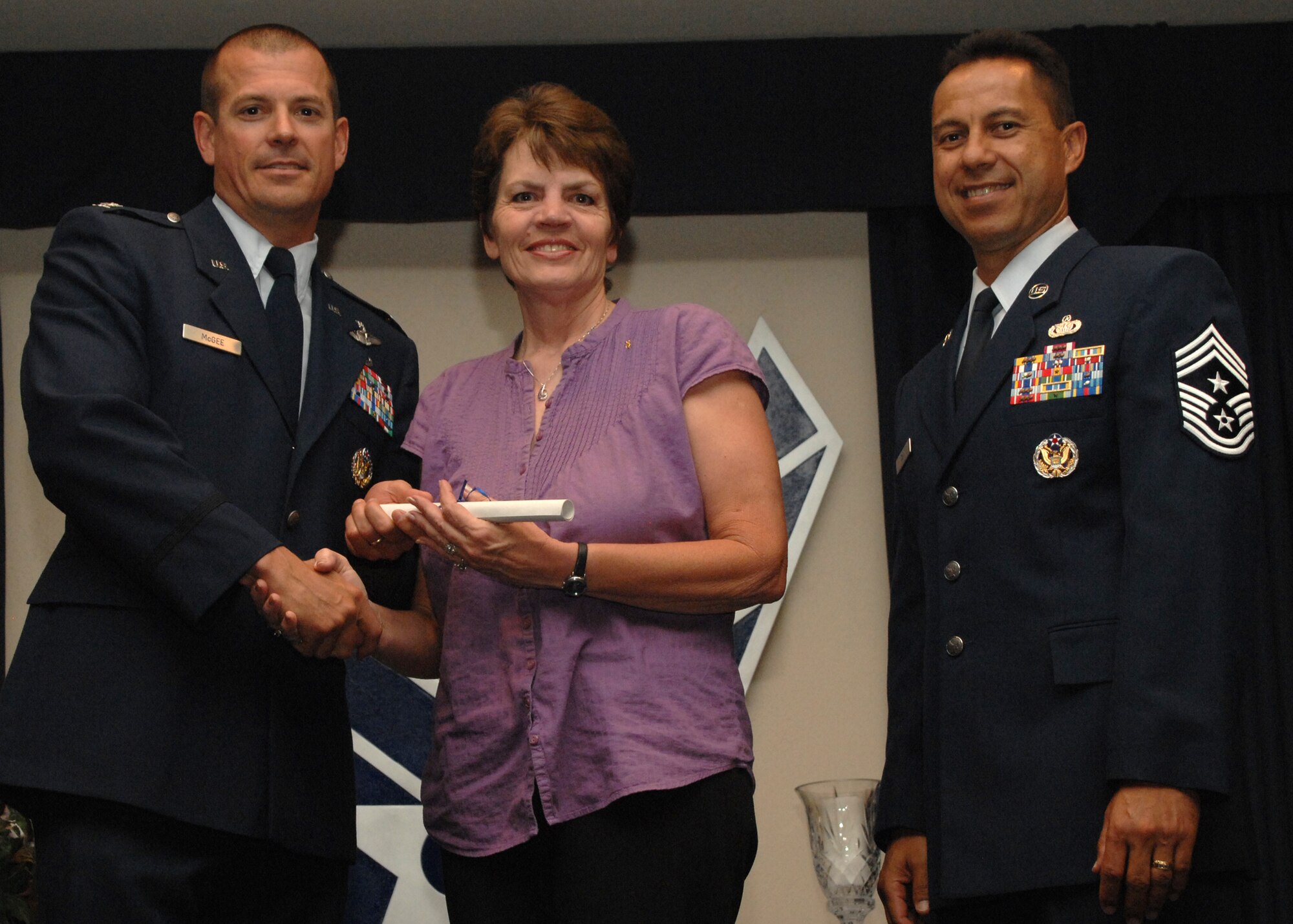 Holloman Air Force Base honors volunteers during the annual Volunteer Recognition Ceremony, June 27 at the Desert Sands Enlisted Club Holloman at Air Force Base, N.M. The ceremony is held to recognize those who volunteered between April 2007 and April 2008. This year the volunteers contributed more than 24,350 hours, which would equate to $158,321,00 if working for minimum wage. The Volunteers spent time at various places and events toinclude; the Holloman AFB Chapel, medical group, Boys and Girls Scouts, Thrift Shop, Airman's Attic, Youth and Teen Center Sports Program, Day of Caring, 572- Ride, Highway Clean-up, Special Oplymics, Big Brothers and BigSisters and many more.(U.S. Air Force photo/ SrA Tiffany Trojca)