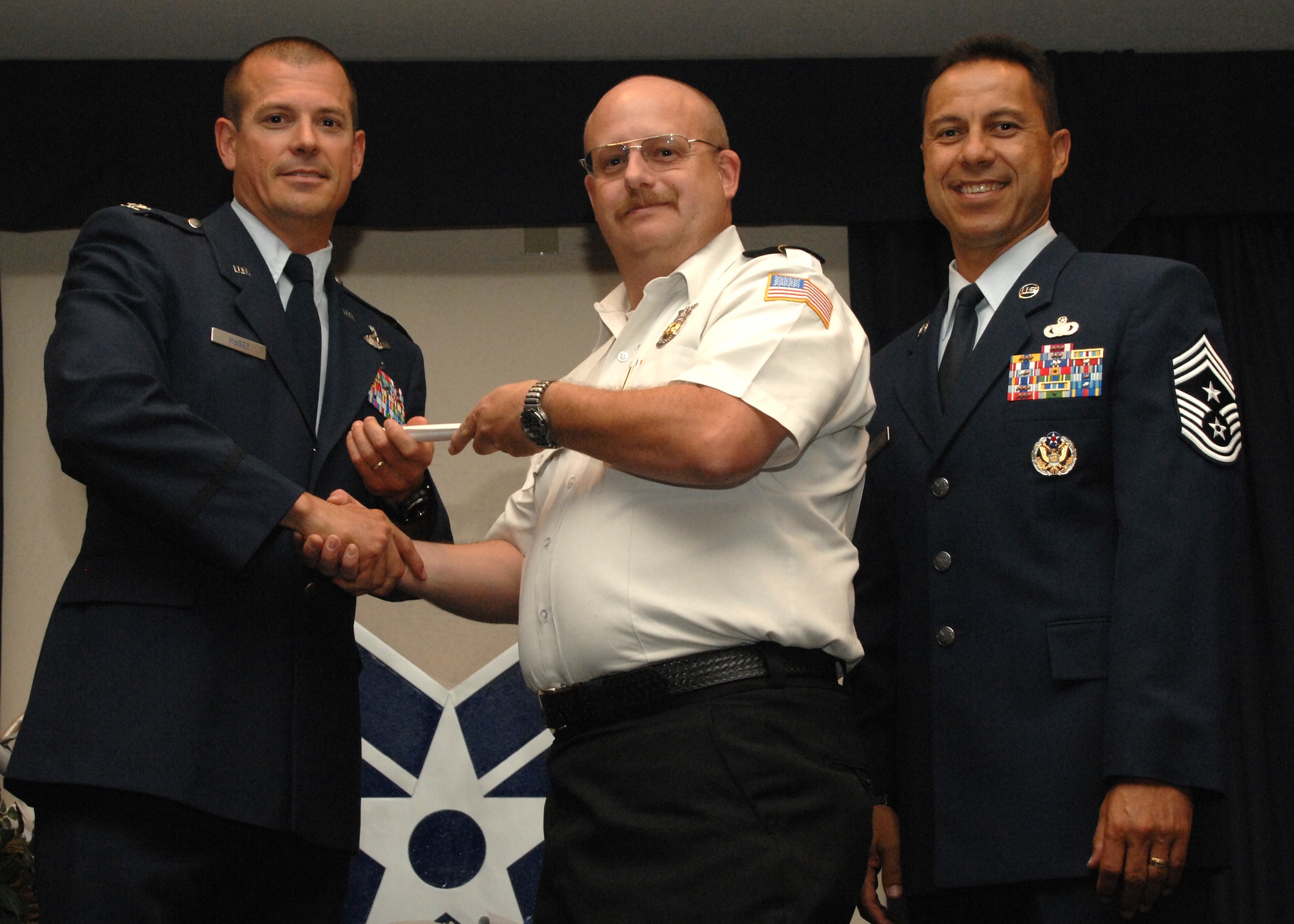 Holloman Air Force Base honors volunteers during the annual Volunteer Recognition Ceremony, June 27 at the Desert Sands Enlisted Club Holloman at Air Force Base, N.M. The ceremony is held to recognize those who volunteered between April 2007 and April 2008. This year the volunteers contributed more than 24,350 hours, which would equate to $158,321,00 if working for minimum wage. The Volunteers spent time at various places and events toinclude; the Holloman AFB Chapel, medical group, Boys and Girls Scouts, Thrift Shop, Airman's Attic, Youth and Teen Center Sports Program, Day of Caring, 572- Ride, Highway Clean-up, Special Oplymics, Big Brothers and BigSisters and many more.(U.S. Air Force photo/ SrA Tiffany Trojca)