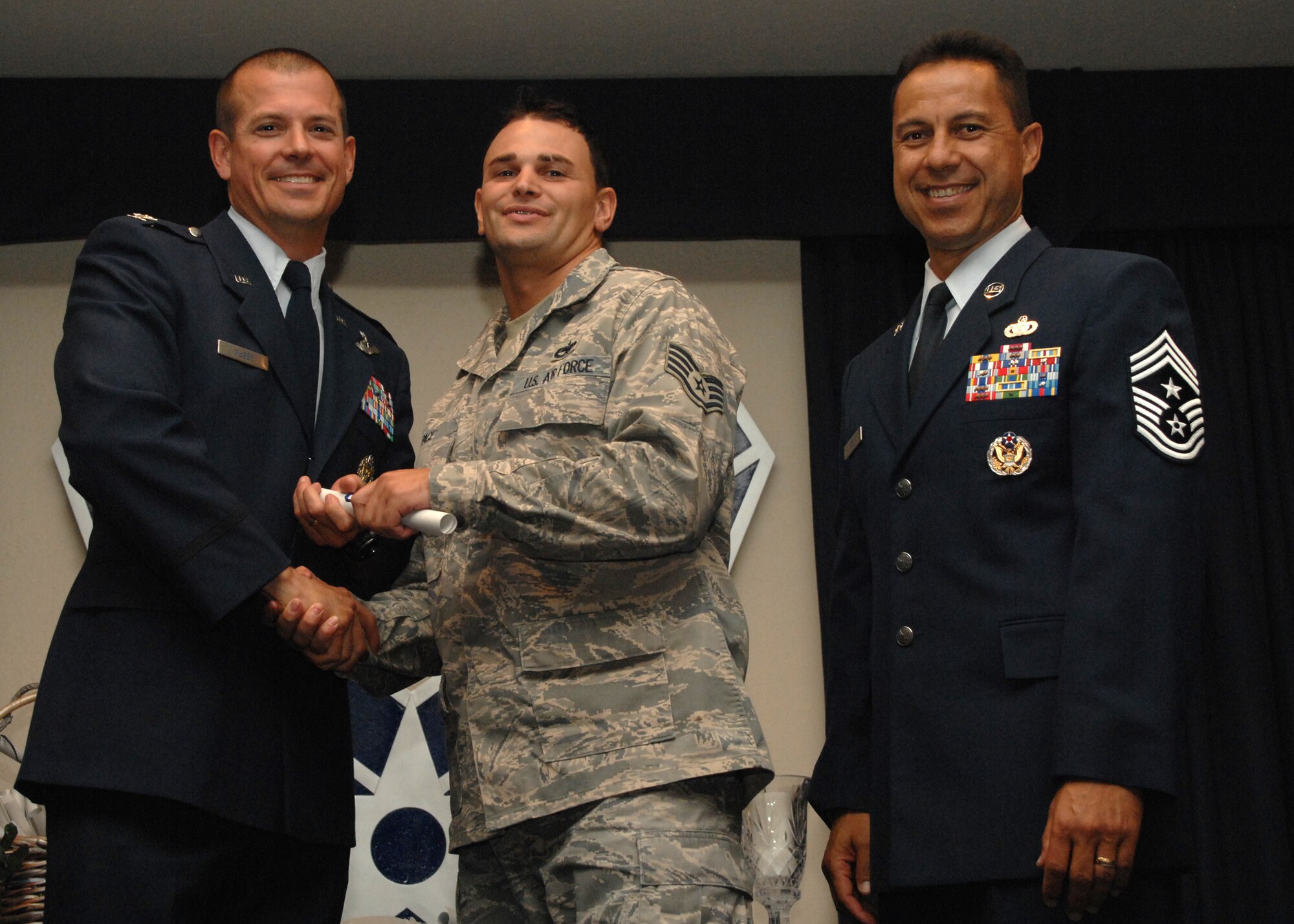 Holloman Air Force Base honors volunteers during the annual Volunteer Recognition Ceremony, June 27 at the Desert Sands Enlisted Club Holloman at Air Force Base, N.M. The ceremony is held to recognize those who volunteered between April 2007 and April 2008. This year the volunteers contributed more than 24,350 hours, which would equate to $158,321,00 if working for minimum wage. The Volunteers spent time at various places and events toinclude; the Holloman AFB Chapel, medical group, Boys and Girls Scouts, Thrift Shop, Airman's Attic, Youth and Teen Center Sports Program, Day of Caring, 572- Ride, Highway Clean-up, Special Oplymics, Big Brothers and BigSisters and many more.(U.S. Air Force photo/ SrA Tiffany Trojca)