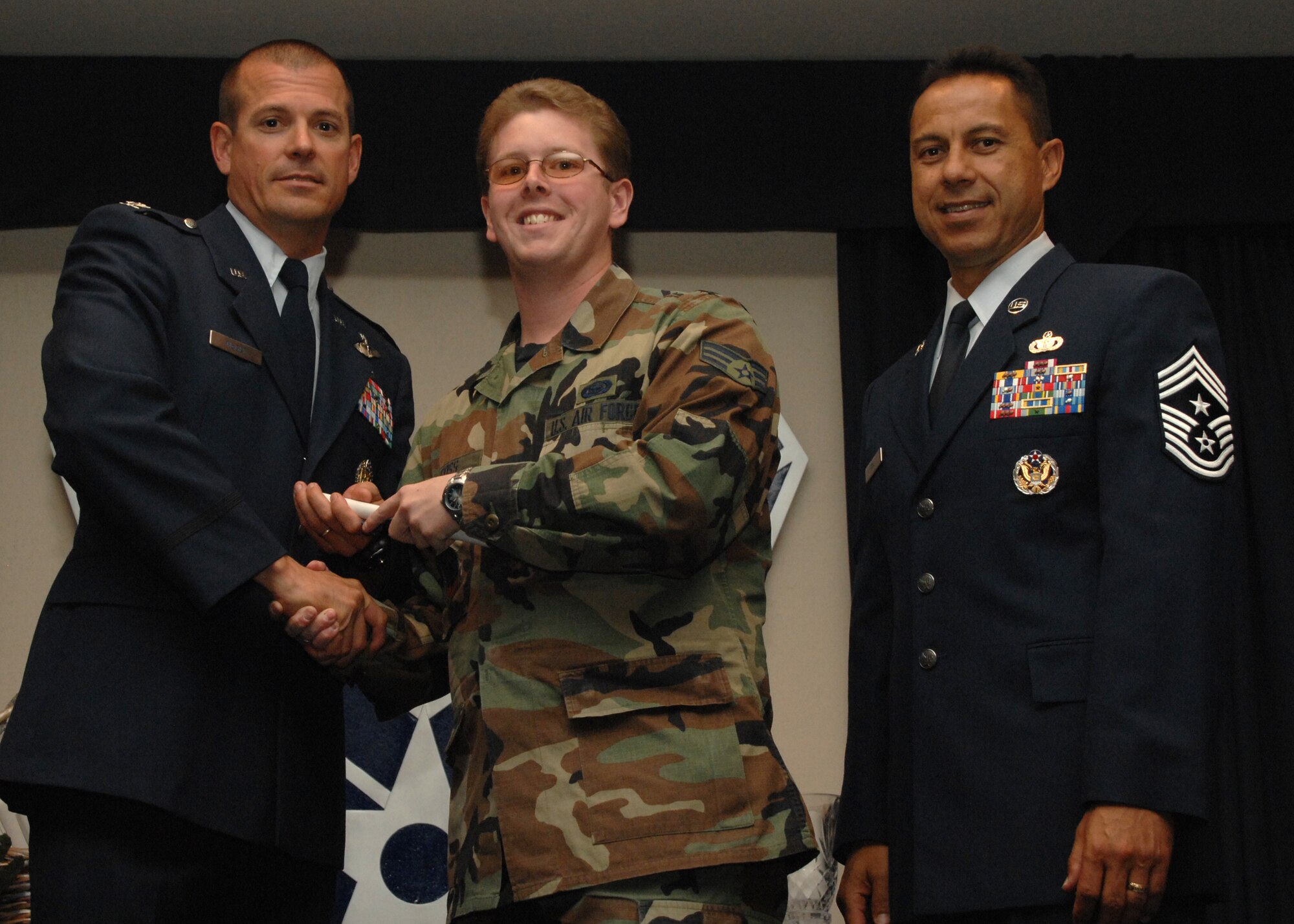 Holloman Air Force Base honors volunteers during the annual Volunteer Recognition Ceremony, June 27 at the Desert Sands Enlisted Club Holloman at Air Force Base, N.M. The ceremony is held to recognize those who volunteered between April 2007 and April 2008. This year the volunteers contributed more than 24,350 hours, which would equate to $158,321,00 if working for minimum wage. The Volunteers spent time at various places and events toinclude; the Holloman AFB Chapel, medical group, Boys and Girls Scouts, Thrift Shop, Airman's Attic, Youth and Teen Center Sports Program, Day of Caring, 572- Ride, Highway Clean-up, Special Oplymics, Big Brothers and BigSisters and many more.(U.S. Air Force photo/ SrA Tiffany Trojca)