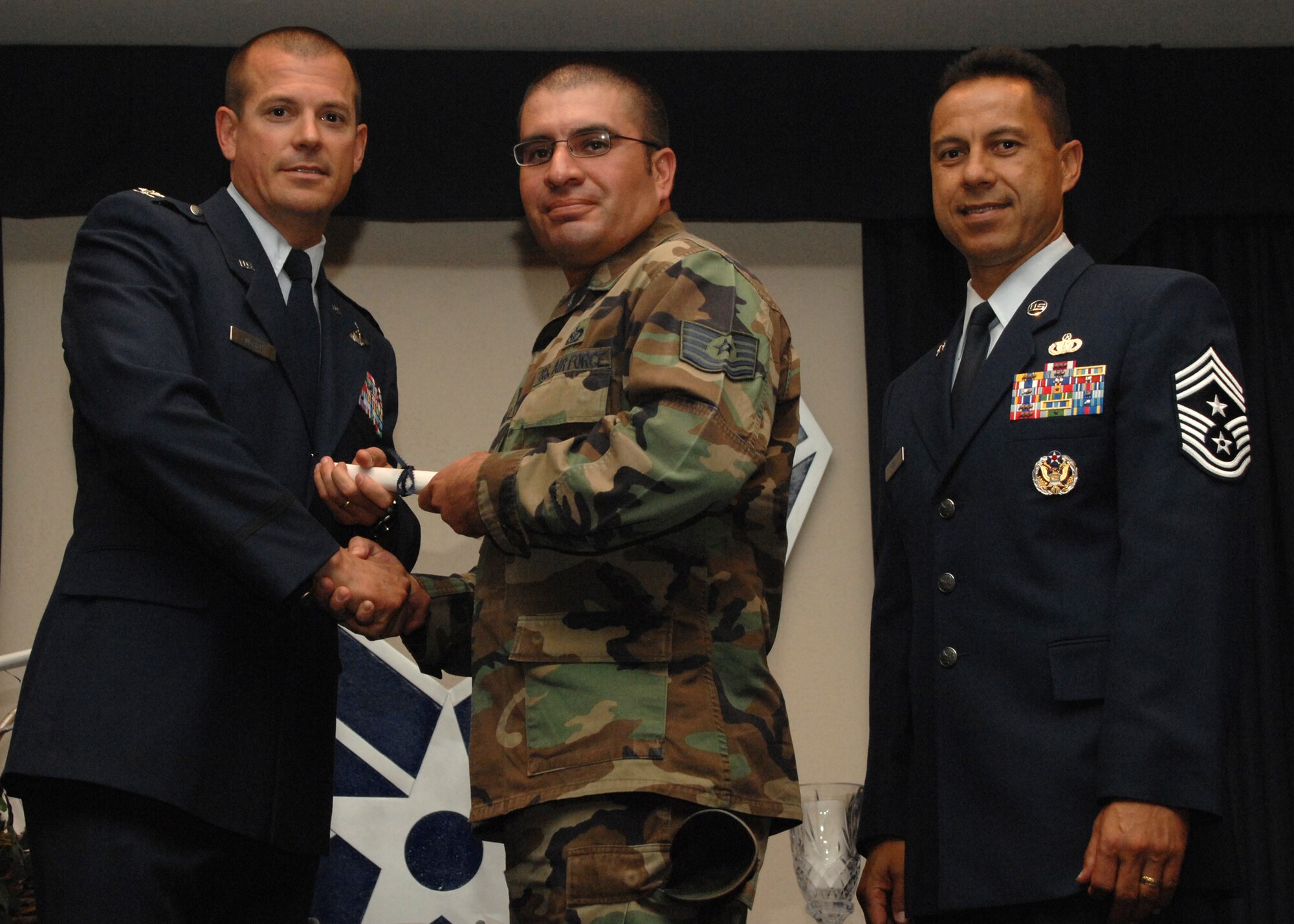 Holloman Air Force Base honors volunteers during the annual Volunteer Recognition Ceremony, June 27 at the Desert Sands Enlisted Club Holloman at Air Force Base, N.M. The ceremony is held to recognize those who volunteered between April 2007 and April 2008. This year the volunteers contributed more than 24,350 hours, which would equate to $158,321,00 if working for minimum wage. The Volunteers spent time at various places and events toinclude; the Holloman AFB Chapel, medical group, Boys and Girls Scouts, Thrift Shop, Airman's Attic, Youth and Teen Center Sports Program, Day of Caring, 572- Ride, Highway Clean-up, Special Oplymics, Big Brothers and BigSisters and many more.(U.S. Air Force photo/ SrA Tiffany Trojca)