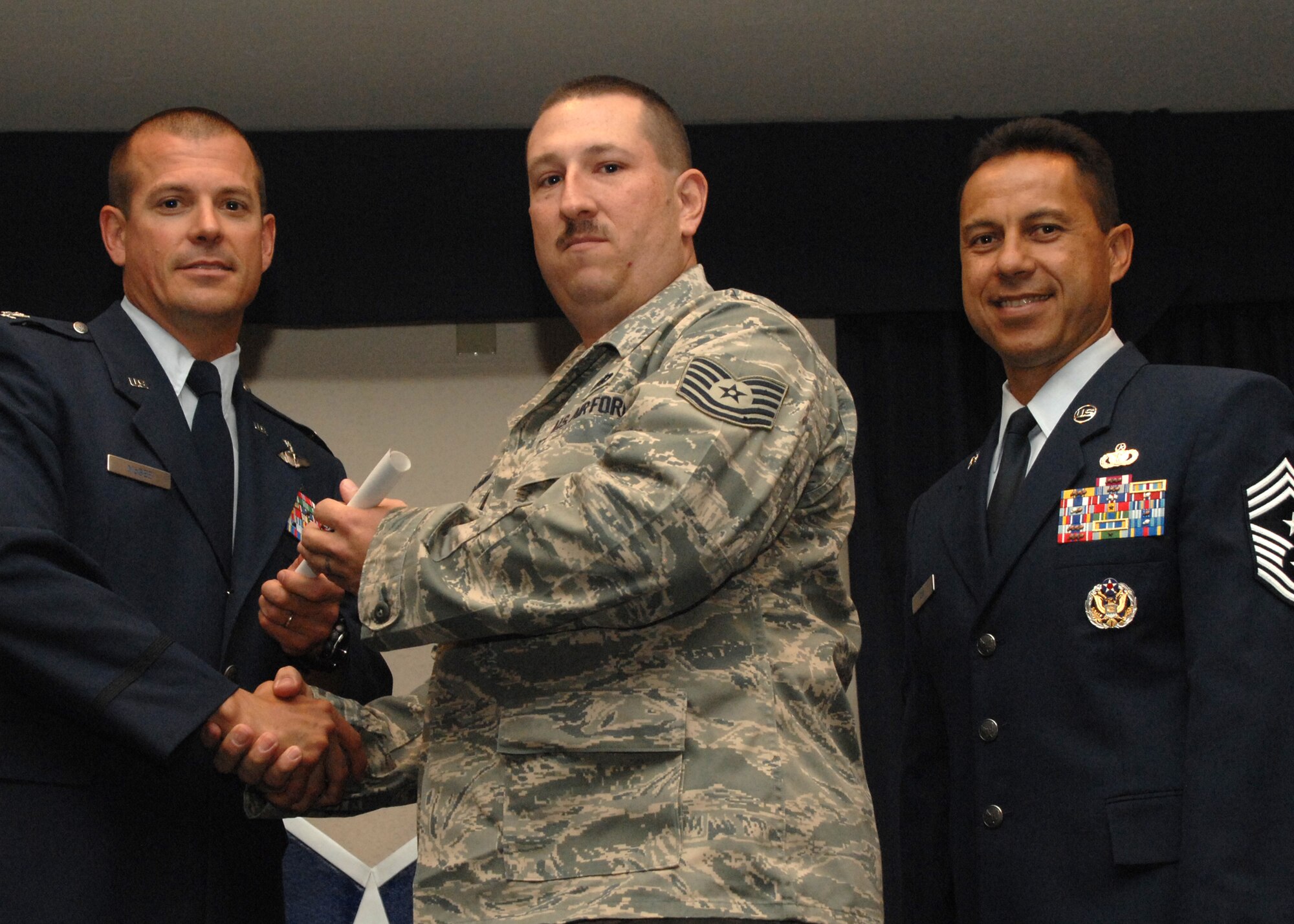 Holloman Air Force Base honors volunteers during the annual Volunteer Recognition Ceremony, June 27 at the Desert Sands Enlisted Club Holloman at Air Force Base, N.M. The ceremony is held to recognize those who volunteered between April 2007 and April 2008. This year the volunteers contributed more than 24,350 hours, which would equate to $158,321,00 if working for minimum wage. The Volunteers spent time at various places and events toinclude; the Holloman AFB Chapel, medical group, Boys and Girls Scouts, Thrift Shop, Airman's Attic, Youth and Teen Center Sports Program, Day of Caring, 572- Ride, Highway Clean-up, Special Oplymics, Big Brothers and BigSisters and many more.(U.S. Air Force photo/ SrA Tiffany Trojca)