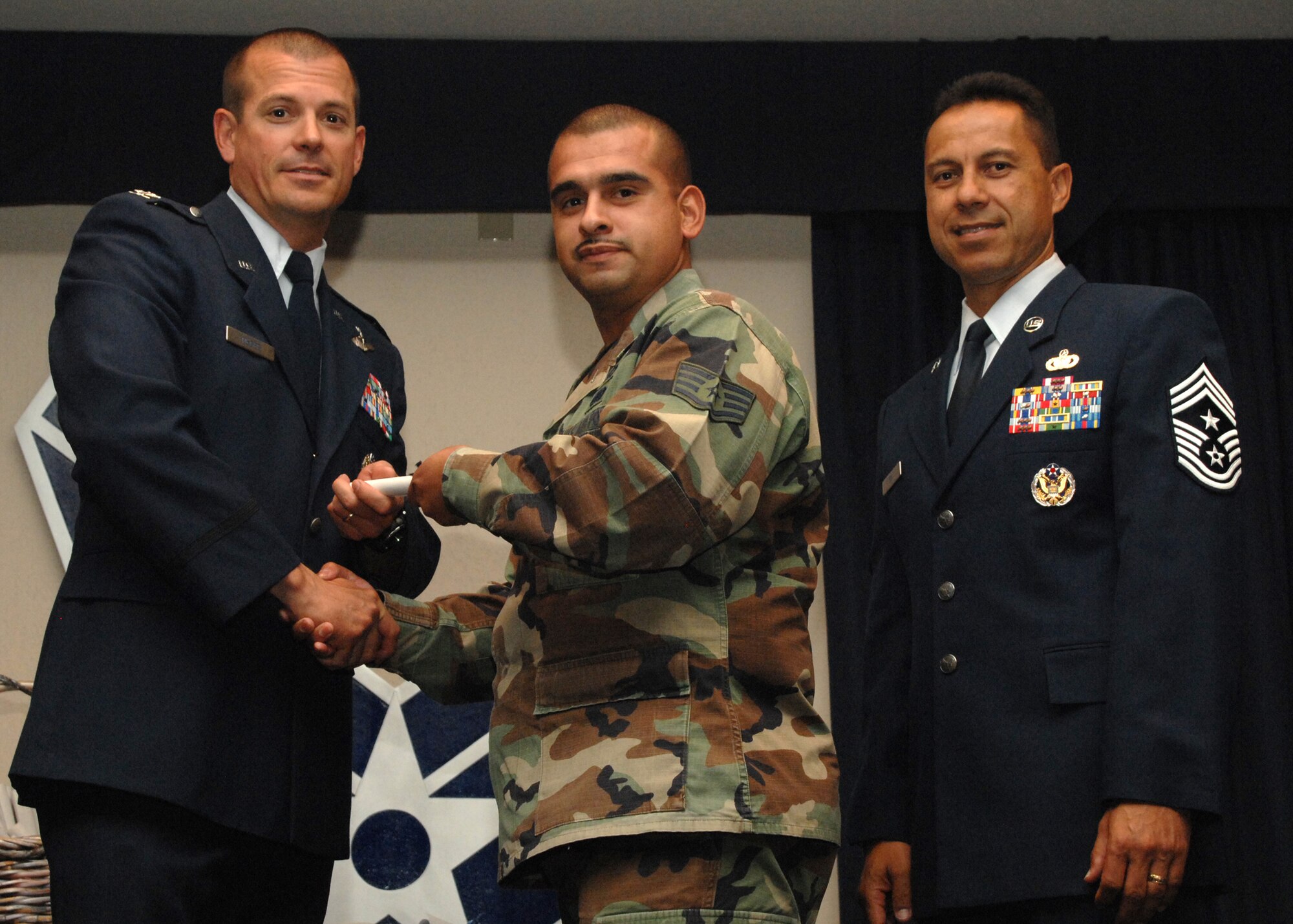 Holloman Air Force Base honors volunteers during the annual Volunteer Recognition Ceremony, June 27 at the Desert Sands Enlisted Club Holloman at Air Force Base, N.M. The ceremony is held to recognize those who volunteered between April 2007 and April 2008. This year the volunteers contributed more than 24,350 hours, which would equate to $158,321,00 if working for minimum wage. The Volunteers spent time at various places and events toinclude; the Holloman AFB Chapel, medical group, Boys and Girls Scouts, Thrift Shop, Airman's Attic, Youth and Teen Center Sports Program, Day of Caring, 572- Ride, Highway Clean-up, Special Oplymics, Big Brothers and BigSisters and many more.(U.S. Air Force photo/ SrA Tiffany Trojca)