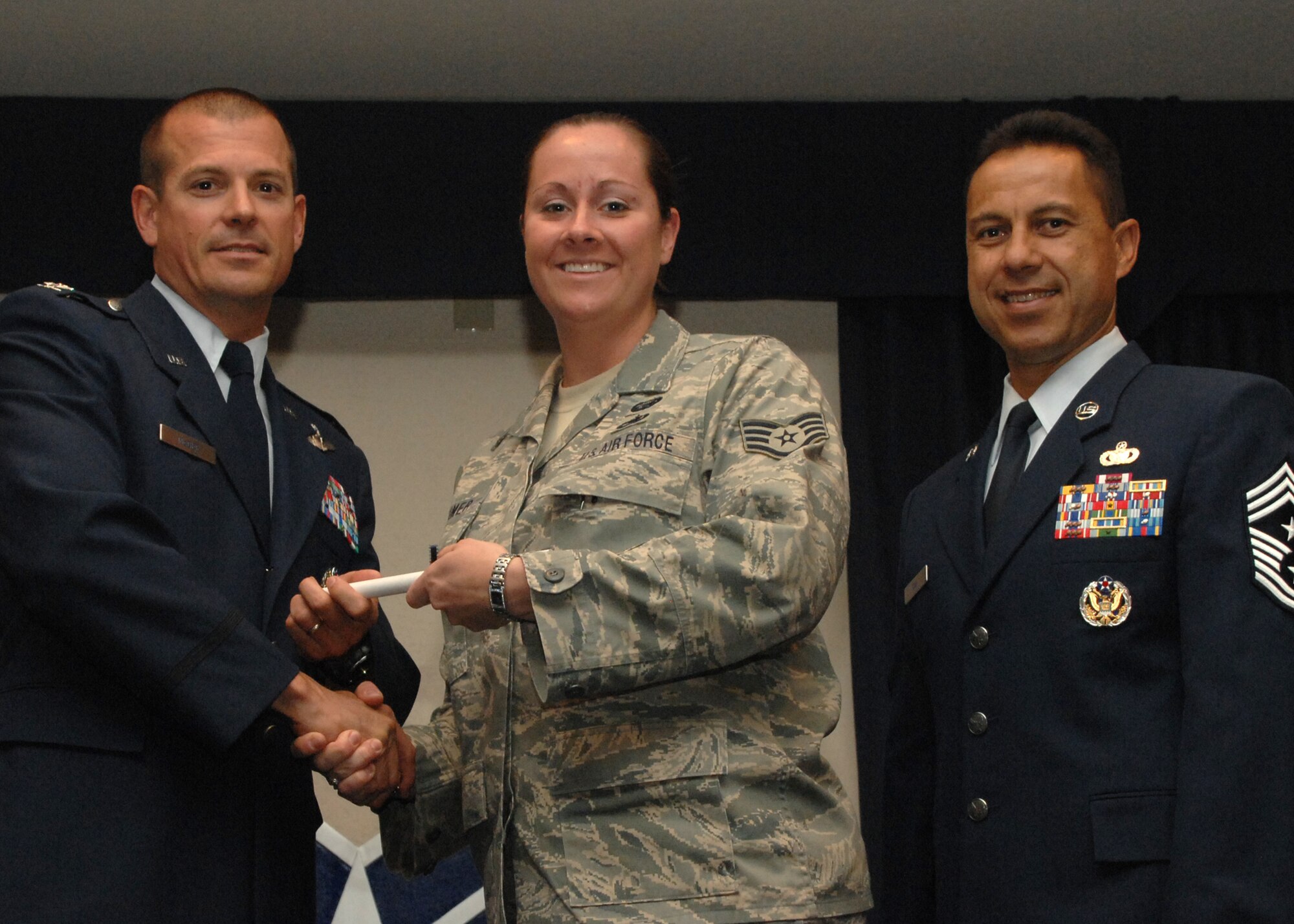 Holloman Air Force Base honors volunteers during the annual Volunteer
Recognition Ceremony, June 27 at the Desert Sands Enlisted Club Holloman at
Air Force Base, N.M. The ceremony is held to recognize those who volunteered
between April 2007 and April 2008. This year the volunteers contributed
more than 24,350 hours, which would equate to $158,321,00 if working for
minimum wage. The Volunteers spent time at various places and events to
include; the Holloman AFB Chapel, medical group, Boys and Girls Scouts,
Thrift Shop, Airman's Attic, Youth and Teen Center Sports Program, Day of
Caring, 572- Ride, Highway Clean-up, Special Oplymics, Big Brothers and Big
Sisters and many more.

(U.S. Air Force photo/ SrA Tiffany Trojca)
