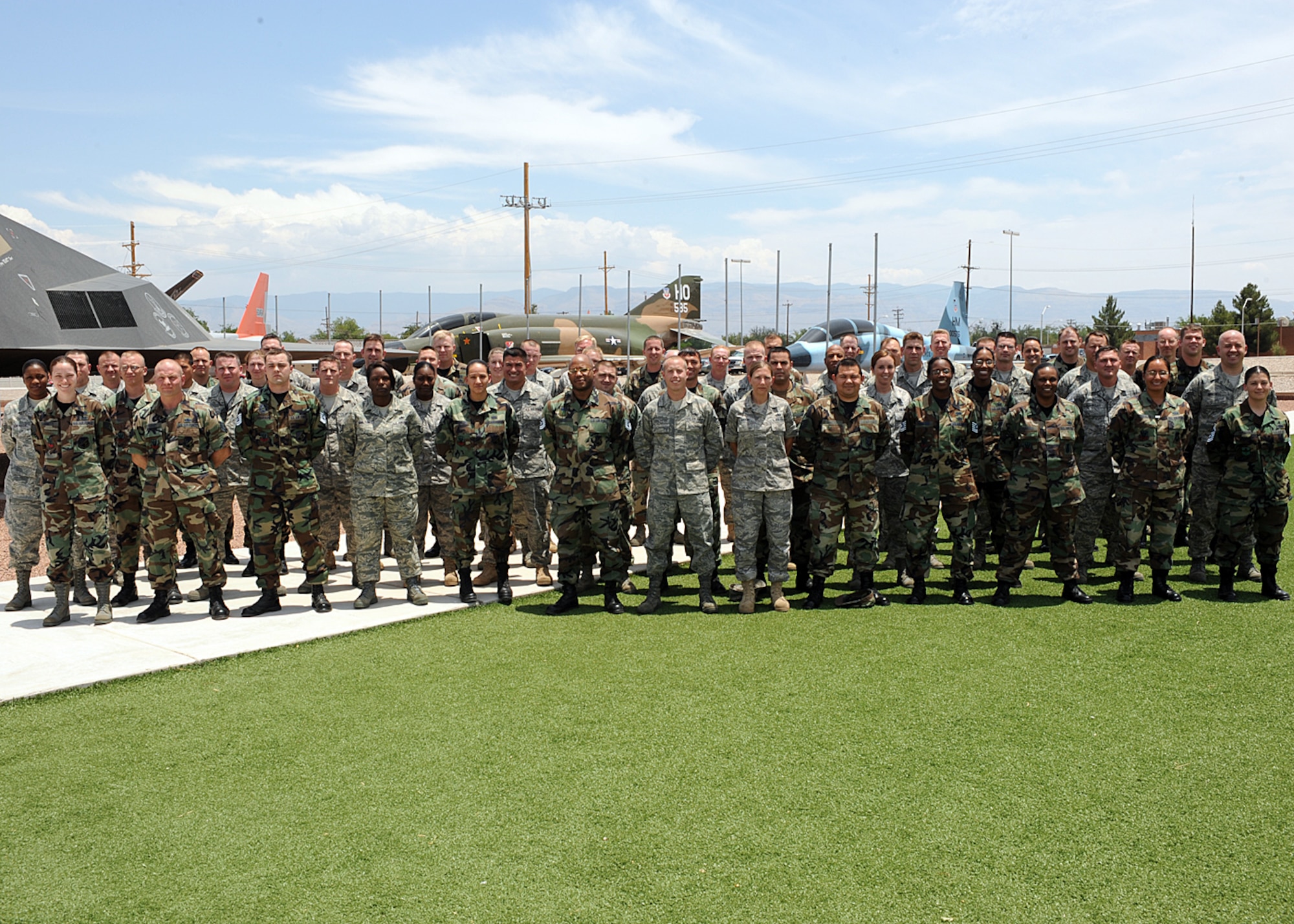 Team Holloman's newest technical and master sergeants select pose for a group photo in Herritage Park June 27 at Holloman Air Force Base, N.M. (U.S. Air Force photo/Airman 1st Class DeAndre Curtiss)