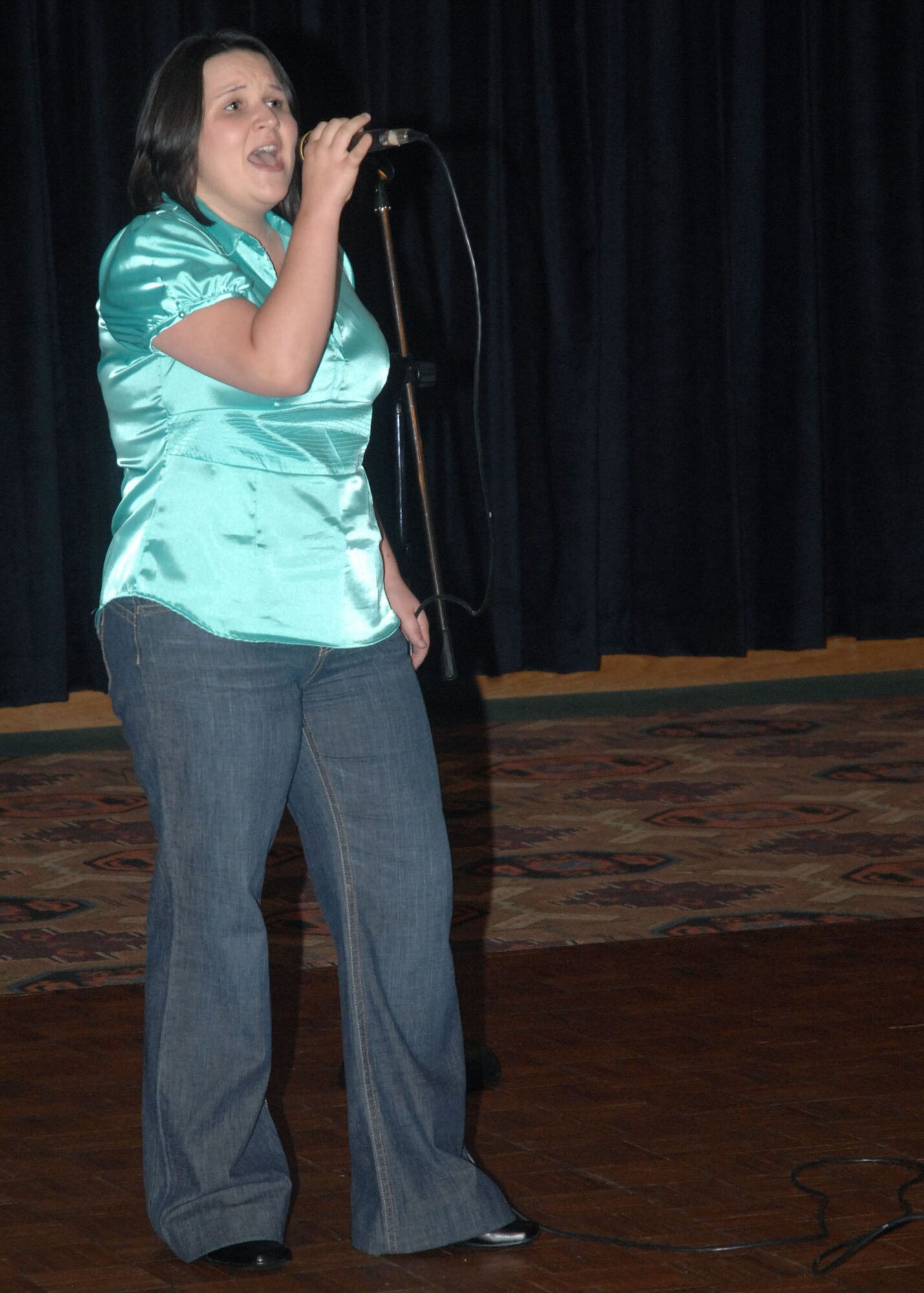 CANNON AIR FORCE BASE, N.M.- Ashley Balter performs one of three songs during Cannon Idol hosted at the Landing June 27. Ms. Balter won first place in the contest and took home the grand prize of $200 and the opportunity to sing on a local radio station. (U.S. Air Force photo/Airman 1st Class Danielle Martin)