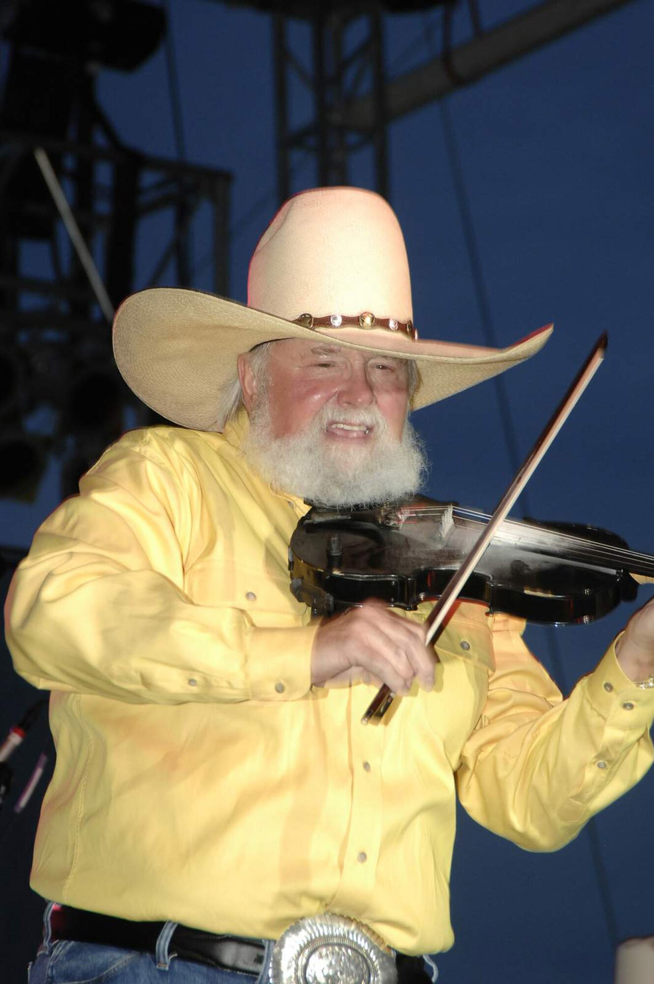 Country music artist Charlie Daniels performs during Freedom's Call Tattoo June 27 on the grounds of the National Museum of the U.S. Air Force in Dayton, Ohio. More than 75,000 peole came out for the event that consisted of aircraft fly overs, food and music by the Air Force Band of Flight, Charlie Daniels Band and local performers. (U.S. Air Force photo/Al Bright) 
