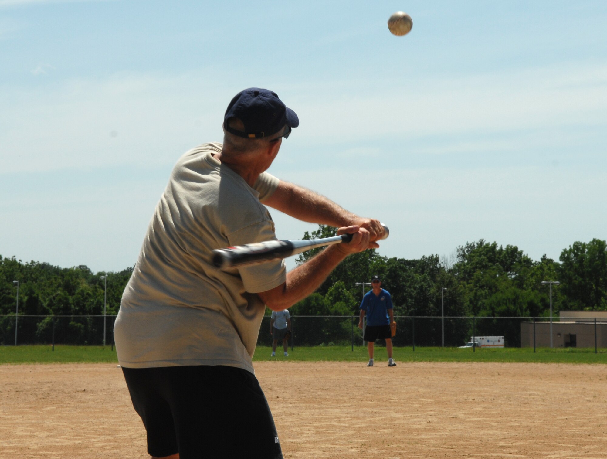 WHITEMAN AIR FORCE BASE, Mo., - Brig. Gen. Gary Harencak, 509th Bomb Wing commander, prepares to hit a pop fly at the Chiefs Vs. Eagles game June 27. Even with honorary colonels from the University of Central Missouri Jennies soft ball team, the Eagles lost to the Chiefs 12-7. The Chiefs team was made up of Whiteman chief master and first sergeants while the Eagles team conisted of colonels and the base commander. (U.S. Air Force photo/Airman 1st Class Stephen Linch)

