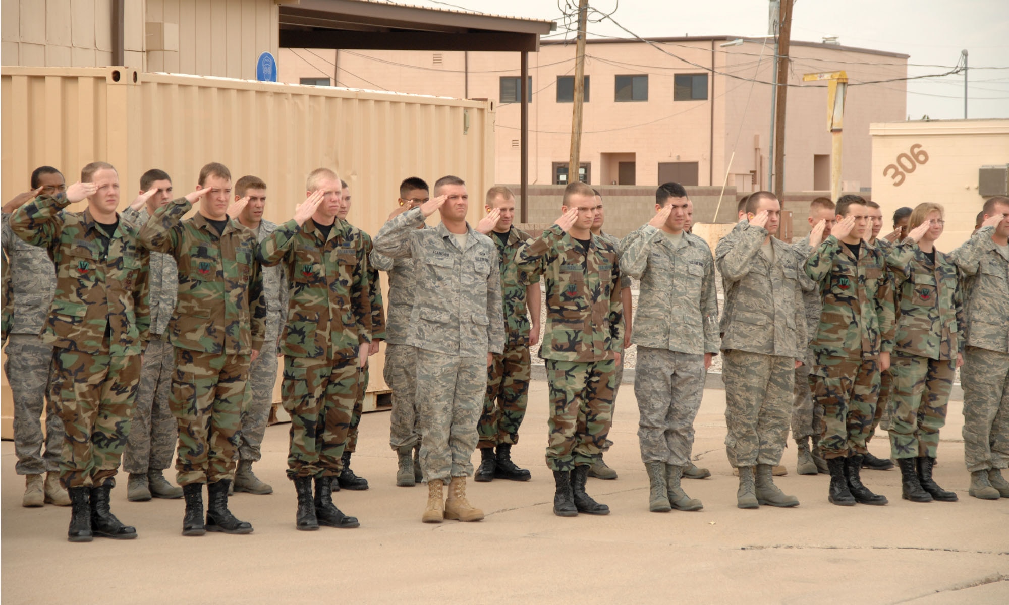 Members of the 49th Operations Group at Holloman Air Force Base, N.M., salute Col. John K. Forsythe as he departs for his fini flight. This is the last flight he will complete at Holloman.(U.S. Air Force photo/Airman 1st Class Jamal Sutter)