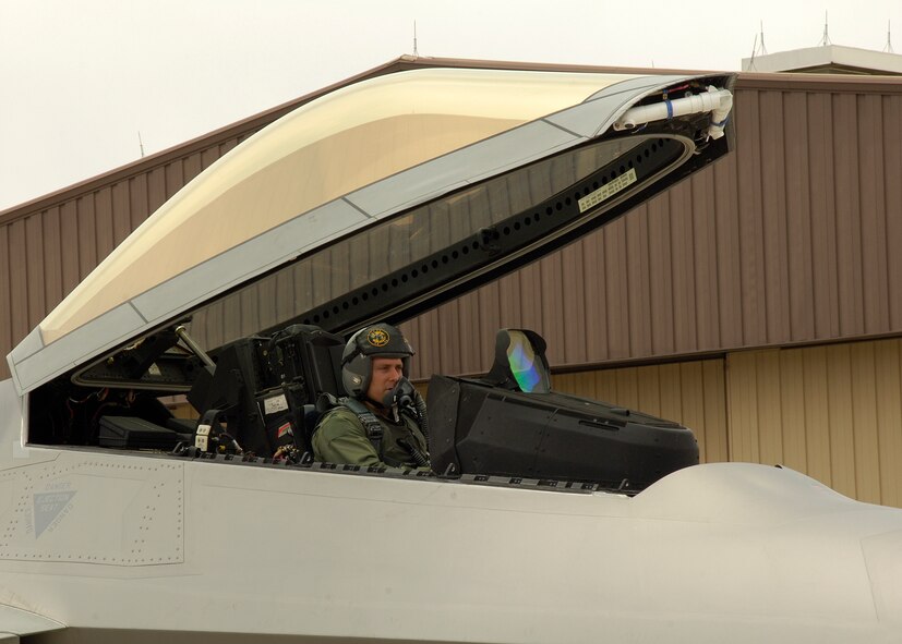 Lt. Col. Craig Baker, 7th Fighter Squadron director of operations, prepares for an F-22A Raptor sortie at Holloman Air Force Base, N.M., June 25. (U.S. Air Force photo/Airman 1st Class Michael Means)