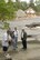 Local reporters interview Wisconsin State Governor Jim Doyle on June 9, 2008 at the site of a 245-acre lake in the resort town of Lake Delton, WI which overflowed earlier that day, destroying several homes as it breached a local highway, and completely drained into the nearby Wisconsin River. Serious flooding throughout the State of WI prompted the governor to declare a state of emergency, allowing Wisconsin's Adjutant General, Brigadier General Don Dunbar to activate National Guard troops to assist in the relief effort.   (US Air National Guard photo by MSgt Paul Gorman) (RELEASED)