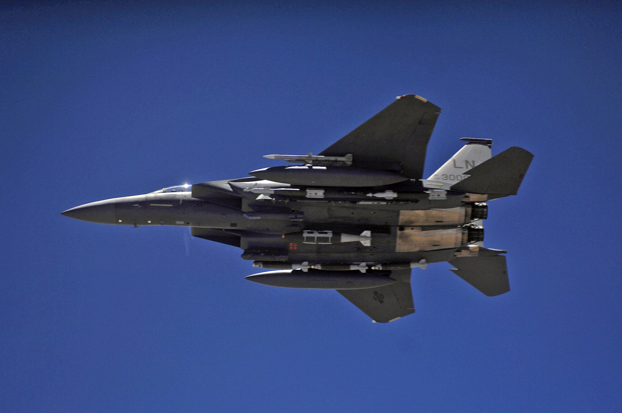 An Air Force F-15E Strike Eagle aircraft waits for his wingman after receiving fuel during a mission over Afghanistan. (U.S. Air Force photo/Master Sgt. Andy Dunaway) 