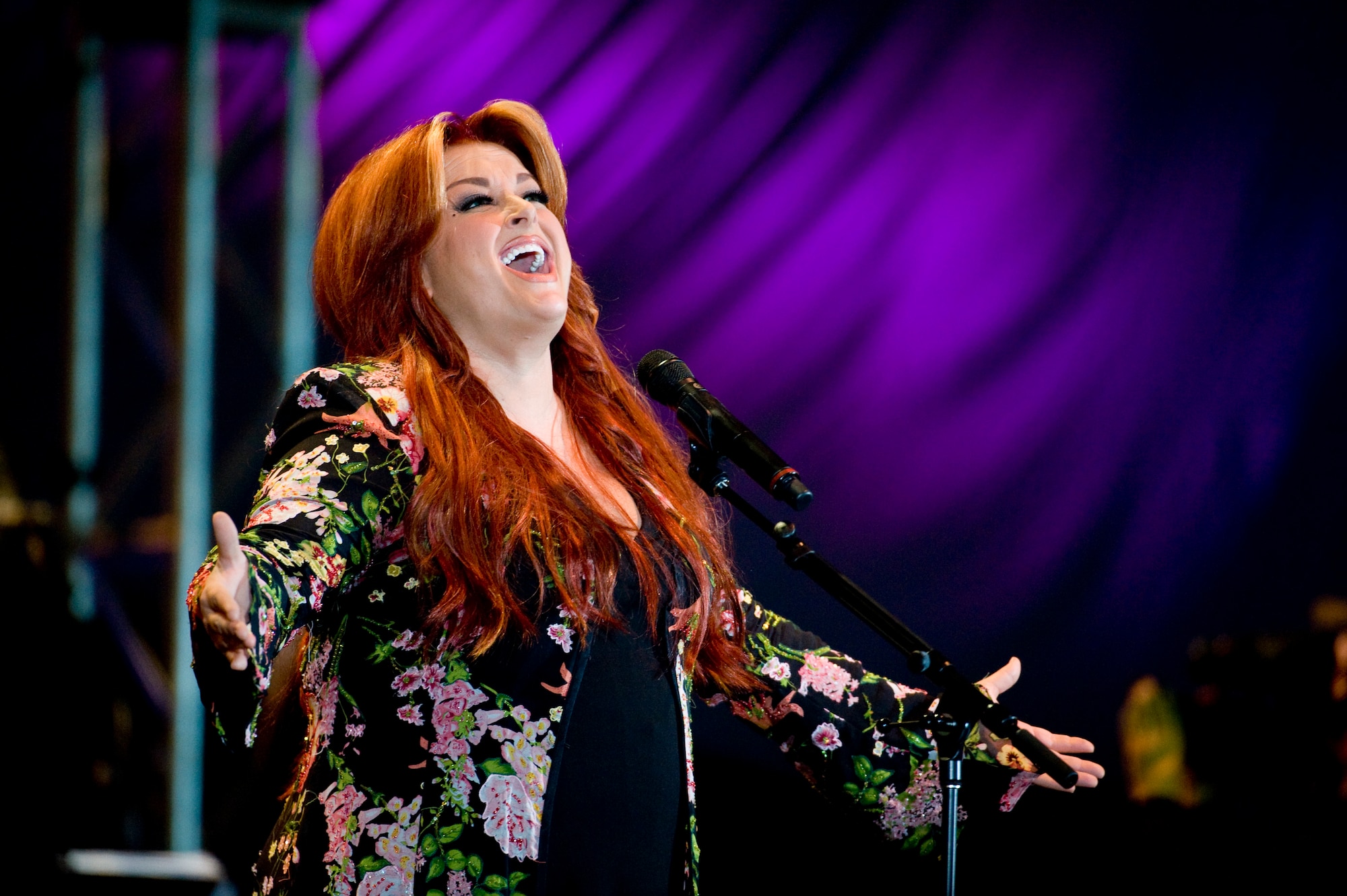 ELMENDORF AIR FORCE BASE, Alaska -- Wynonna Judd performs to the military and Alaska crowd at the "Alaska's Concert for the Military" June 27 at Hangar 2. The concert was a part of Alaska's 50 years statehood celebration. (U.S. Air Force photo by Senior Airman Jonathan Steffen)