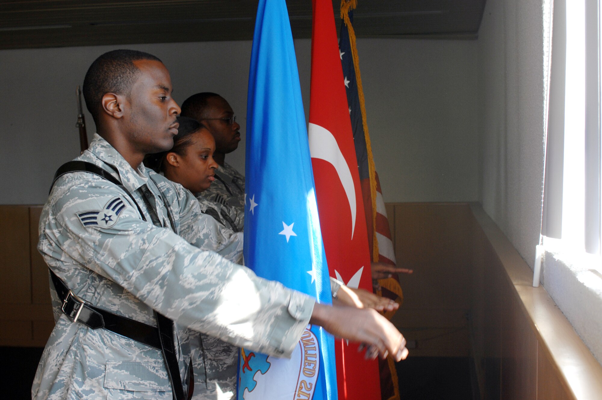 Senior Airman Donald Davis, Incirlik Honor Guard member, practices posting the Colors with two other teammates. The team holds practices every Tuesday from 3-6 p.m. in building 480. (United States Air Force photo by Staff Sgt. Jeff Nevison)