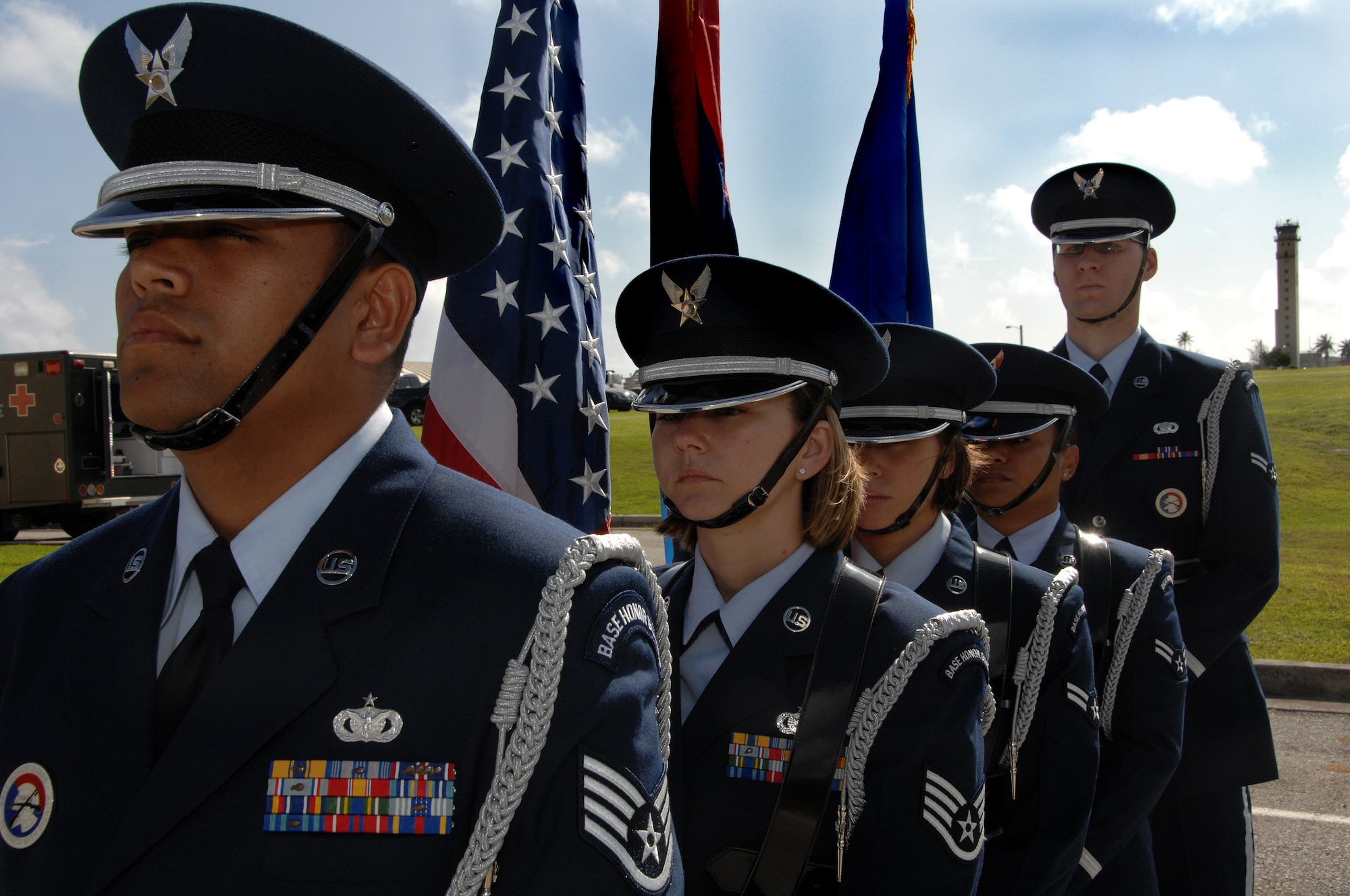 Team Andersen's Honor Guard awaits Presentation of Colors at the 36th Mobility Response Squadron Assumption of Command on June 30. The Team Andersen Honor Guard's primary mission is to provide final military honors to our fallen military members.   (U.S. Air Force photo by Airman 1st Class Courtney Witt)
