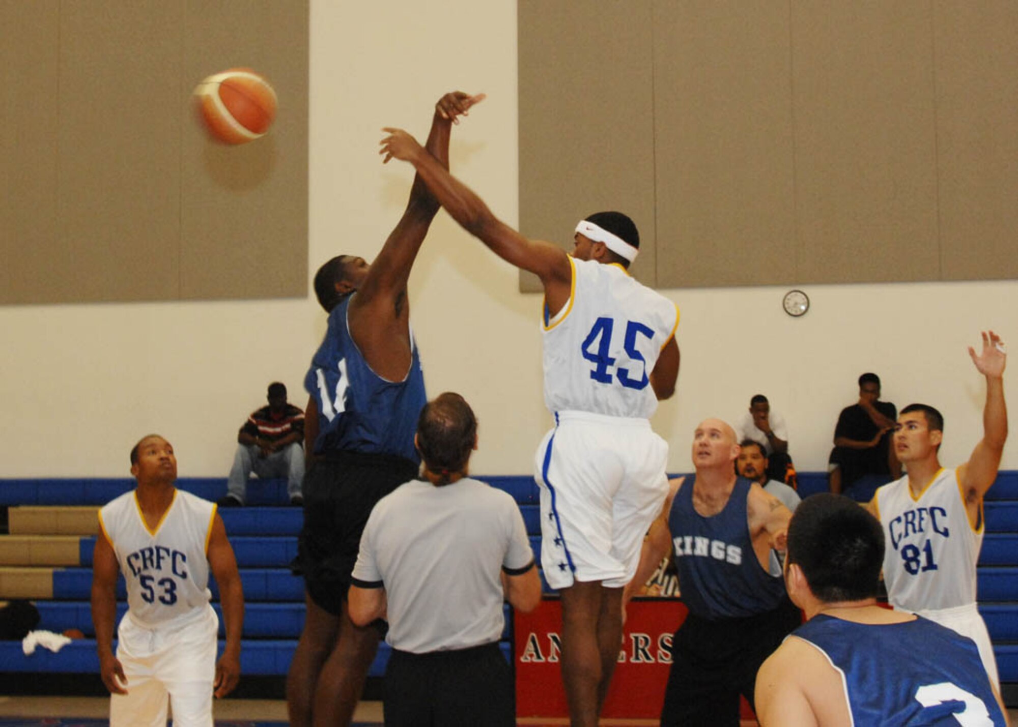 Andersen AFB Stars tip off against the Budweiser Kings, a local Guam basketball team, officially starting the  second game of the Andersen Summer Slam tournament at the Coral Reef Fitness Center here June 27. The Andersen Summer Slam is held annually at Andersen AFB with various teams  around the island and  Pacifia Air Forces. (U.S. Air Force photo by Airman 1st Class Nichelle Griffiths)