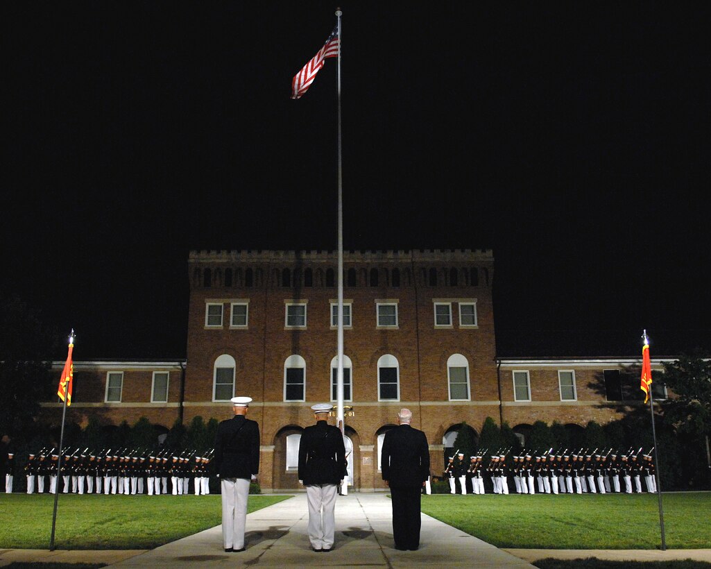 From left, Marine Lt. Gen. Richard S. Kramlich, director of the Marine Corps staff, Marine Gen. James E. Cartwright, vice chairman of the Joint Chiefs of Staff, and Defense Secretary Robert M. Gates prepare to receive honors during the evening parade at Marine Barracks Washington, D.C., June 27, 2008. 