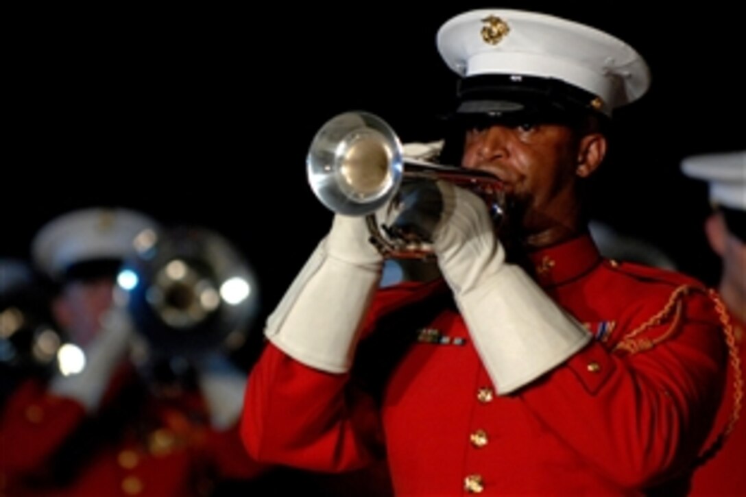 A member of "The Commandant's Own," The United States Marine Drum and Bugle Corps, performs during the evening parade at Marine Barracks Washington, D.C., June 27, 2008. Marine Gen. James E. Cartwright, vice chairman of the Joint Chiefs of Staff, was the host for the parade. 