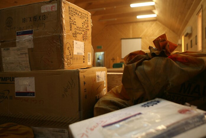 Boxes of cookies, batteries, snacks and other items fill the chapel at Camp Ripper, Iraq, June 30.  Words of Comfort, Hope and Promise, a military outreach group in San Clemente, Calif., sent this batch of care packages to show their support of the service members deployed with Regimental Combat Team 5.  Since arriving to Iraq in January, several groups from Southern California have been sending care packages to RCT-5 and the service members greatly appreciate the support they are shown.::r::::n::