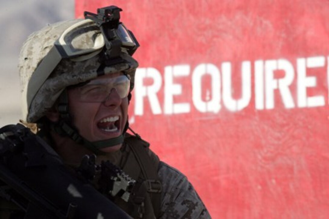 Pfc. Justin Rodgers yells a firing command during Mojave Viper March 3. Rodgers and other Marines of 2nd Battalion, 7th Marine Regiment started the desert pre-deployment training to prepare for their upcoming tour to Afghanistan. Once the battalion arrives in country, they will support the Afghan military. Rodgers is an 18-year-old assaultman from Company E. He is from Roanoke, Texas.