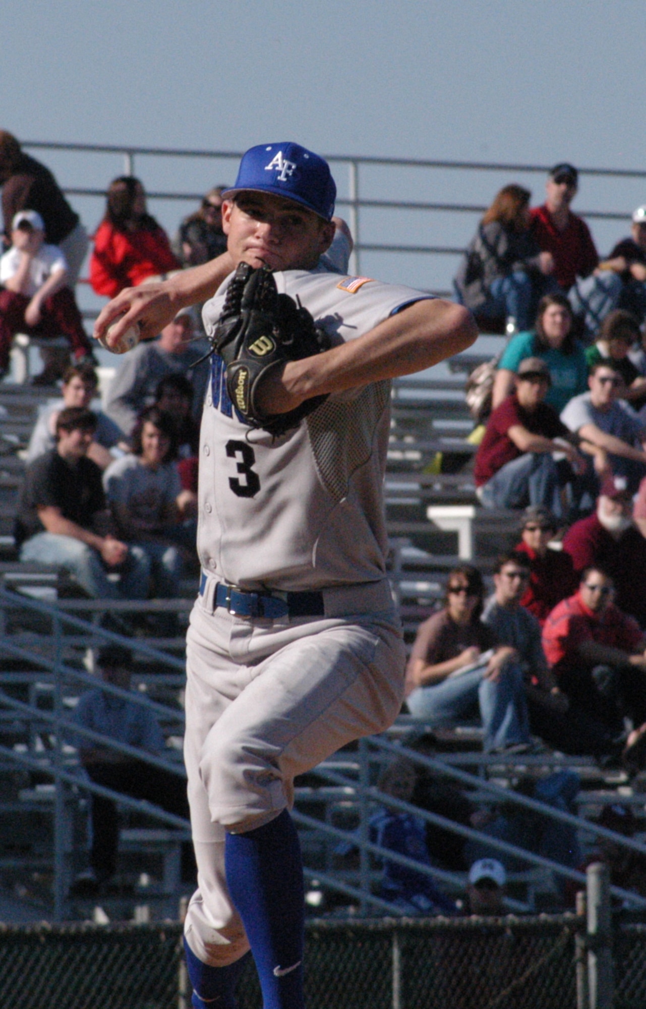 Falcons’ pitcher Alex Truesdale attempts to pickoff an opponent trying to steal first base during the first game of a three set series in Starkville, Miss., against the Mississippi State University Bulldogs March 1. The U.S. Air Force Academy lost the series 1-2. (U.S. Air Force photo by Senior Airman John Parie)