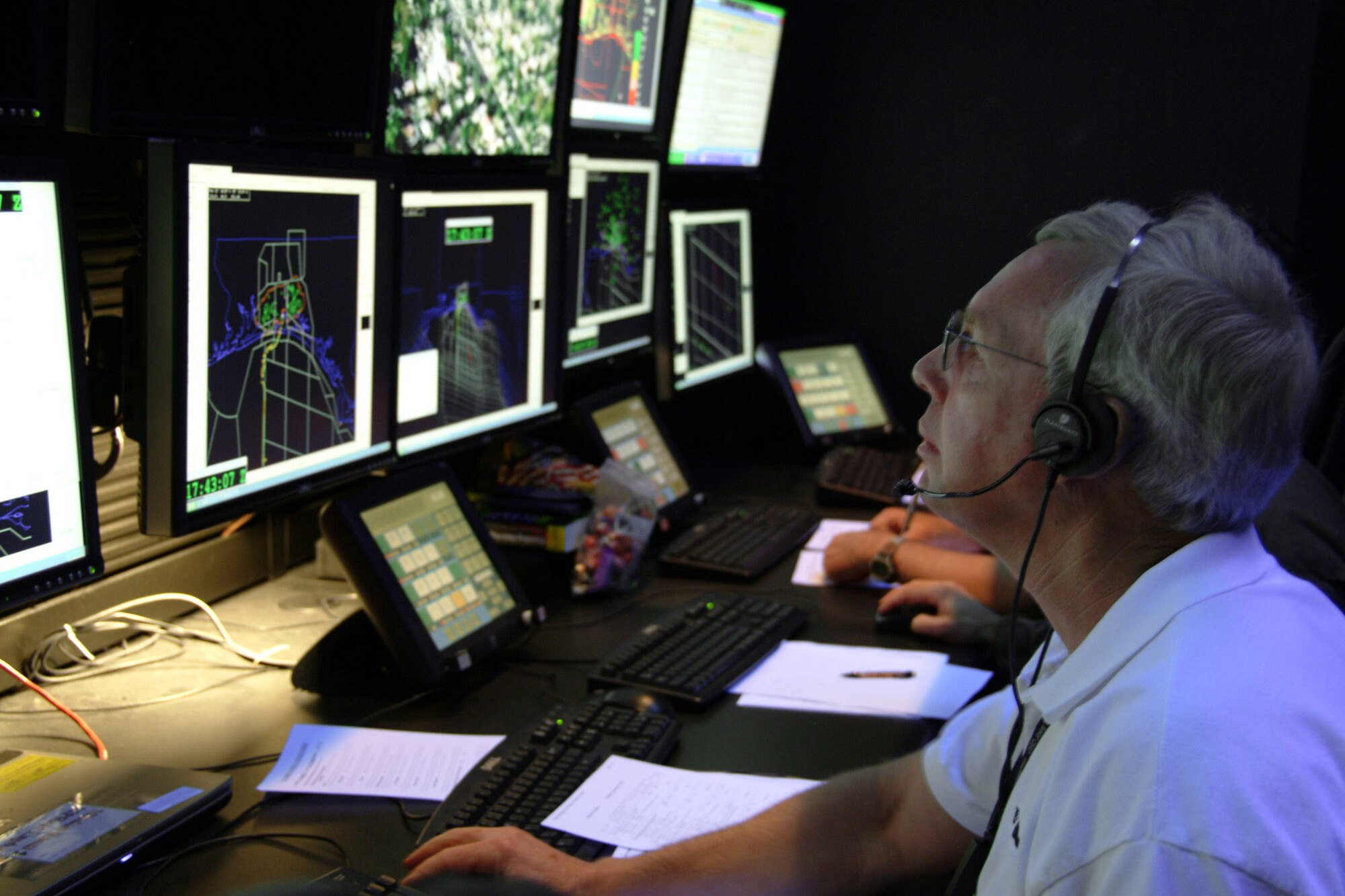 John Crane monitors the B-1B tail warning function test Feb. 25 at the Central Control Facility at Eglin Air Force Base, Fla. The tail warning function is a radar that faces the rear of B-1B to detect incoming missiles or aircraft. If detected the system can deploy defensive countermeasures. Mr. Crane is a 36th Electronic Warfare Squadron B-1B defense systems engineer. (U.S. Air Force photo/Capt. Carrie Kessler) 
