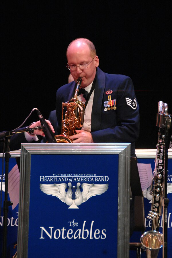 Staff Sgt. Scott Miller, baritone saxophonist with the USAF Heartland of America Band Noteables jazz ensemble, displays his technical abilities during a solo on Buddy Rich's famous "Love for Sale."  