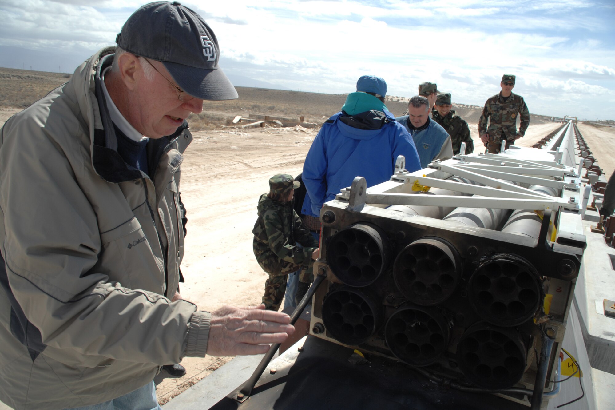 Alan Langhorn performs a levitation-magnet inspection after a successful launch of a rocket sled Feb. 21 at Holloman Air Force Base, N.M. The launch was the 846th Test Squadron's fifth magnetic-levitation developmental test. (U.S. Air Force photo/Airman 1st Class Jamal D. Sutter) 