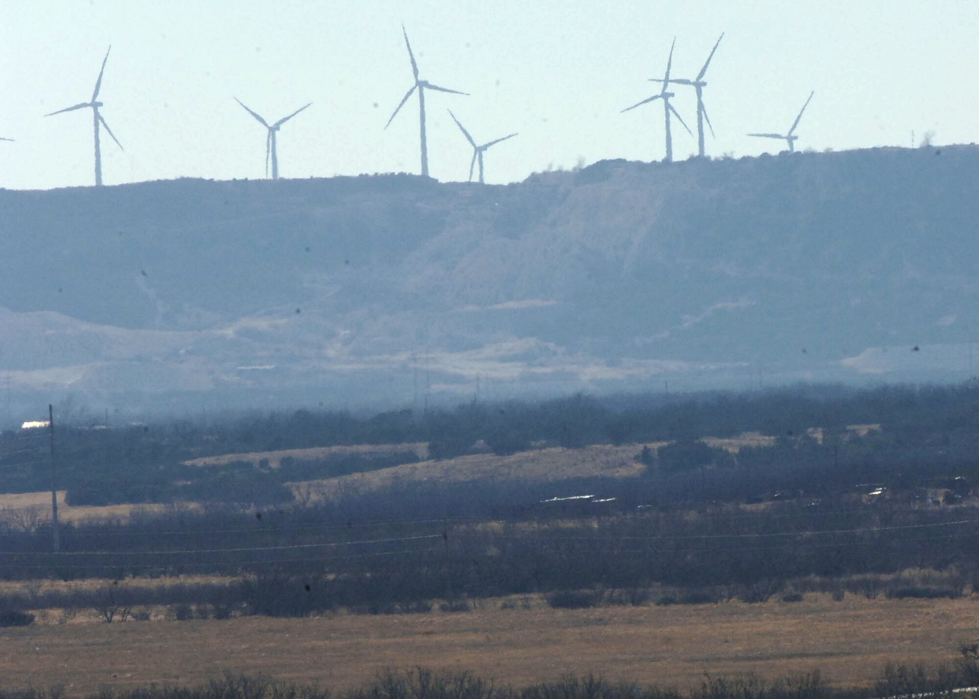 DYESS AIR FORCE BASE, Texas -- Windmills dot the western Dyess skyline Feb. 29. 100 percent of Dyess' energy comes from renewable sources like wind energy.
(U.S. Air Force photo by Airman 1st Class Felicia Juenke)