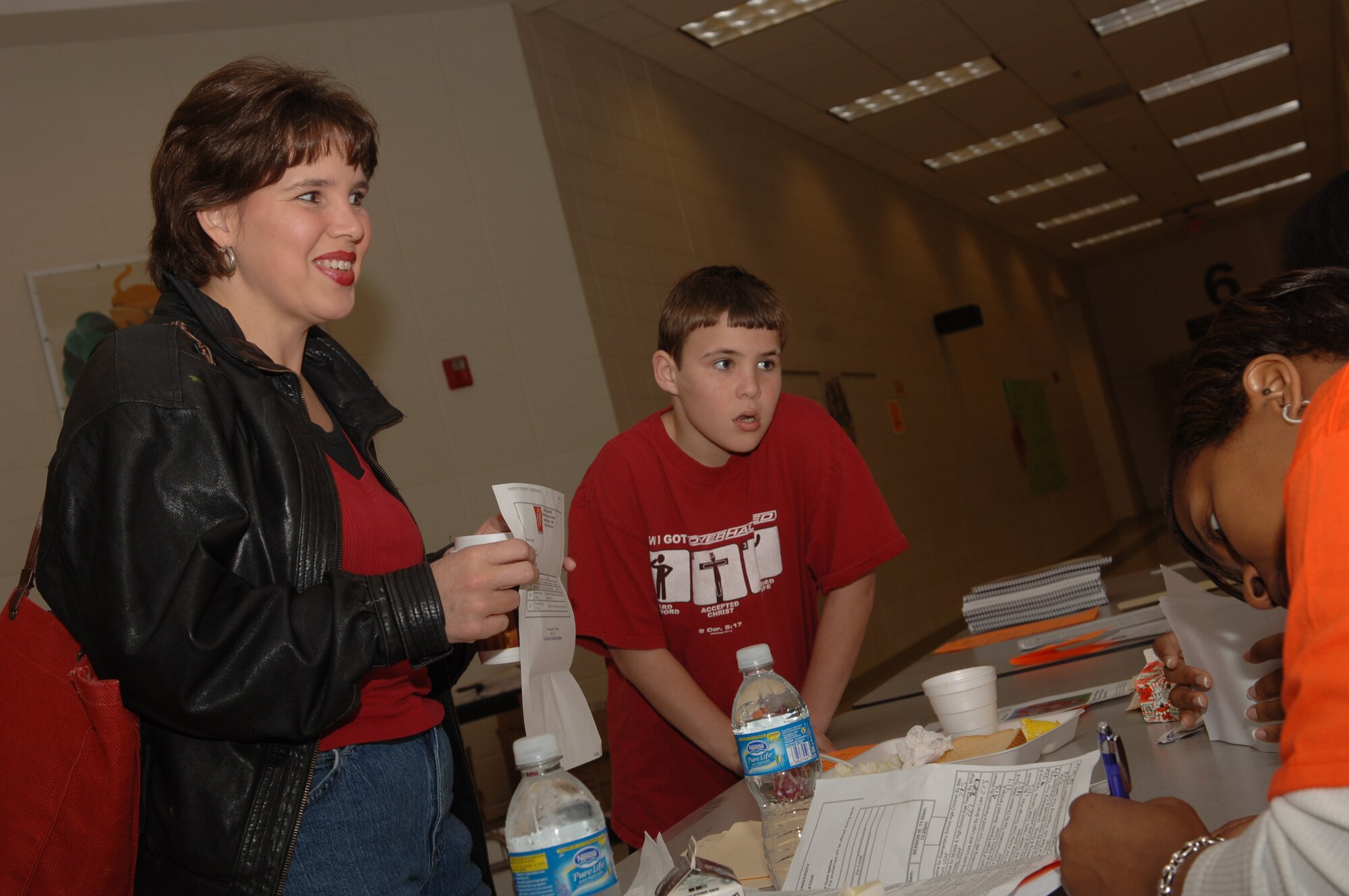 MOODY AIR FORCE BASE, Ga – Rena Taylor, Clyattville Elementary School teacher and her son Jeremy, register at Parent University 2008 held Mar. 1. Rena attends the event, which is held annually, for personal reasons and to better understand the students she teaches. (U.S. Air Force photo by Senior Airman Schelli Jones) 