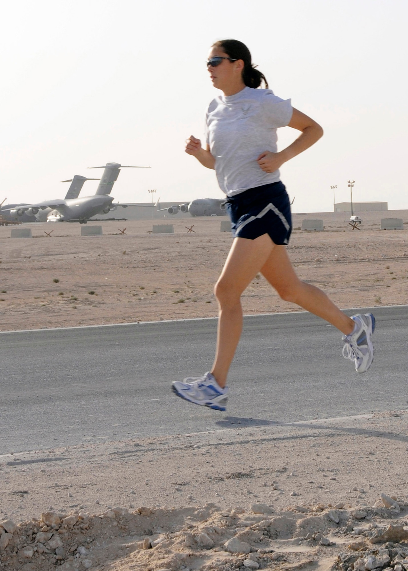 1st Lt. Jessica Jessica Lopez trains for the L.A. Marathon from her deployed location Feb. 13 in Southwest Asia. After she received deployment orders and realized she would miss running the marathon stateside with her mother, Dawn, on March 2, the duo decided to run the marathon at the same time, 11 time zones apart. Lieutenant Lopez finished in 3:39. (U.S. Air Force photo/Senior Airman Domonique Simmons) 