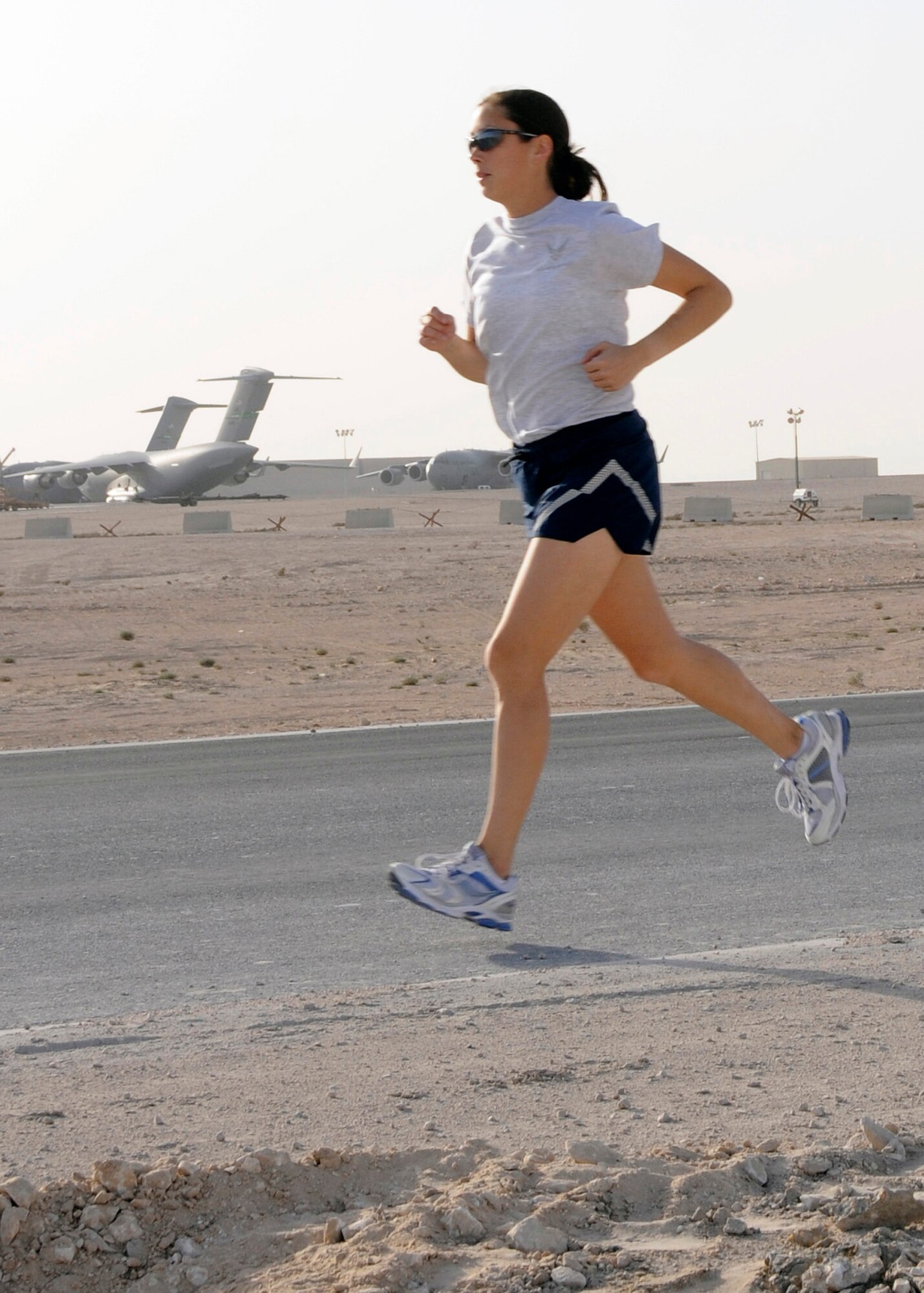 1st Lt. Jessica Jessica Lopez trains for the L.A. Marathon from her deployed location in Southwest Asia Feb. 13. After she received deployment orders and realized she would miss running the marathon stateside with her mother, Dawn, March 2, the duo decided to run the marathon at the same time, 11 time zones apart. Lieutenant Lopez finished in 3:39. (U.S. Air Force photo/Senior Airman Domonique Simmons)