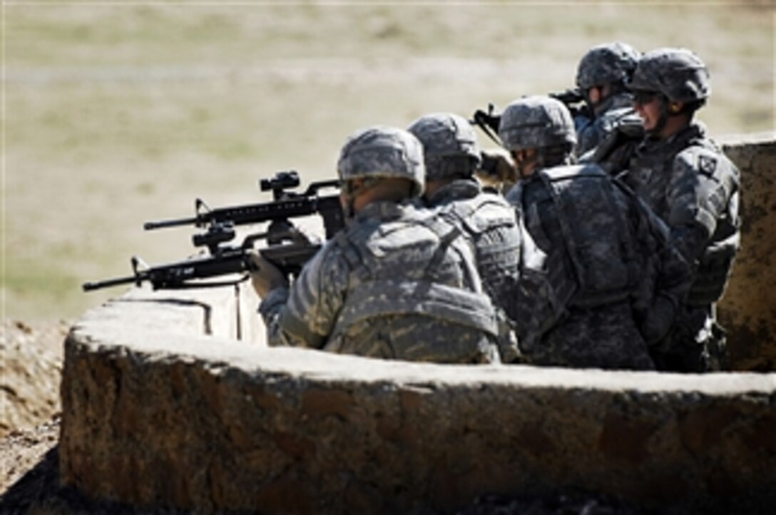 Soldiers from the U.S. Army's Delta Company, 2nd Battalion, 22nd Infantry Regiment, 10th Mountain Division, take aim as they maintain weapons qualifications on the Warrior Range in Kirkuk, Iraq, on Feb. 28, 2008.  
