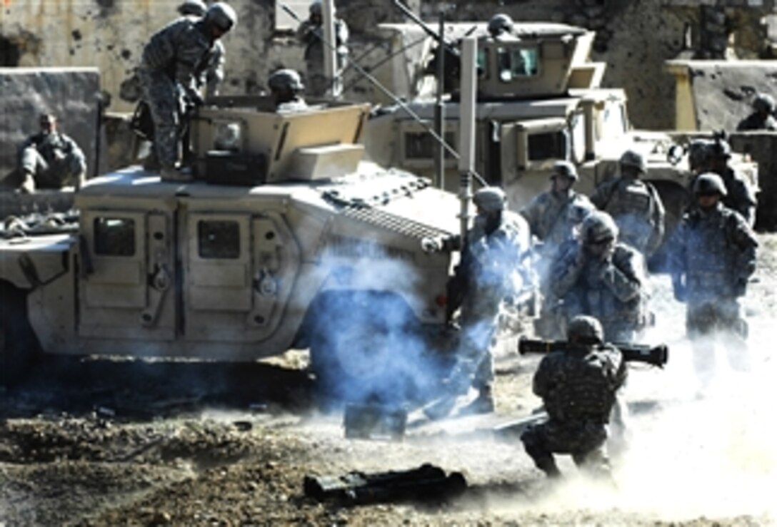 U.S. Army soldiers assigned to Delta Company, 2nd Battalion, 22nd Infantry Regiment, 10th Mountain Division, maintain weapons qualifications on the Warrior Range in Kirkuk, Iraq, Feb. 28, 2008. 