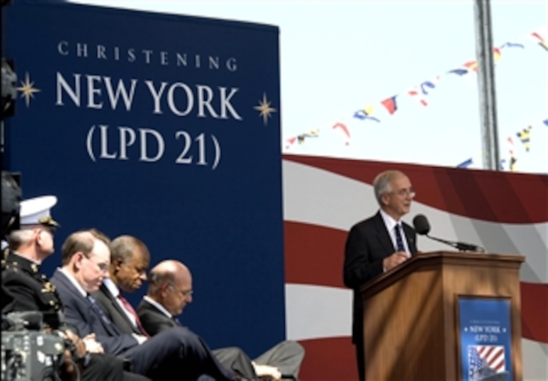 Deputy Secretary of Defense Gordon England speaks during the christening ceremony for the USS New York in Avondale, La., March 1, 2008. The ship is the fifth of nine San Antonio-class amphibious transport dock ships, and the first to be named after a state instead of a city. The vessel was named in remembrance of the victims of 9/11, and was built partly with steel from the ruins of the World Trade Center. 