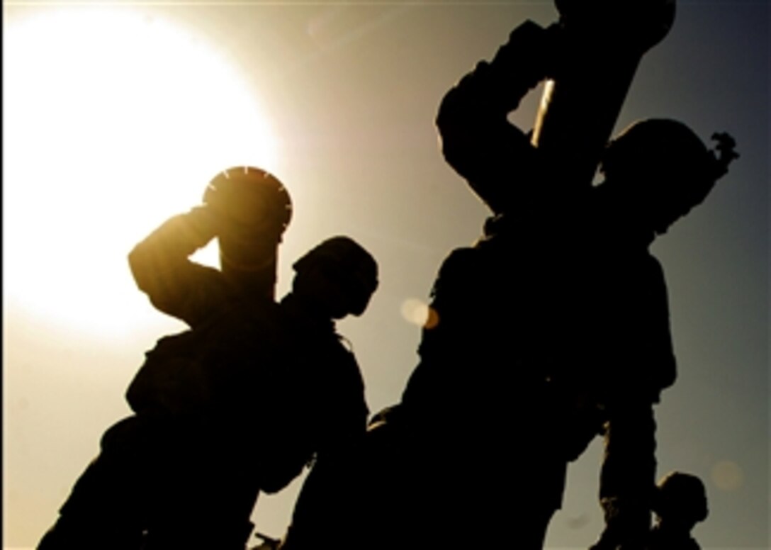 U.S. Army soldiers from Delta Company, 2nd Battalion, 22nd Infantry Regiment, 10th Mountain Division maintain weapons qualifications on the Warrior Range in Kirkuk, Iraq, Feb. 28, 2008. 
