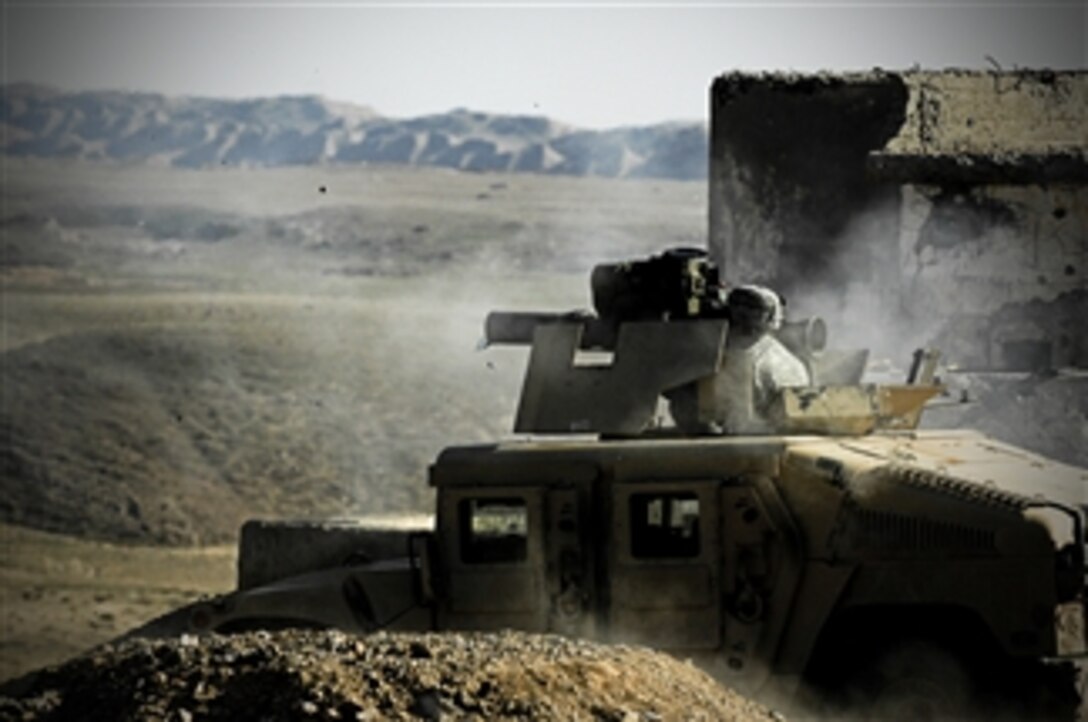 U.S. Army soldiers from Delta Company, 2nd Battalion, 22nd Infantry Regiment, 10th Mountain Division, maintain weapons qualifications on the Warrior Range in Kirkuk, Iraq, Feb. 28, 2008. 