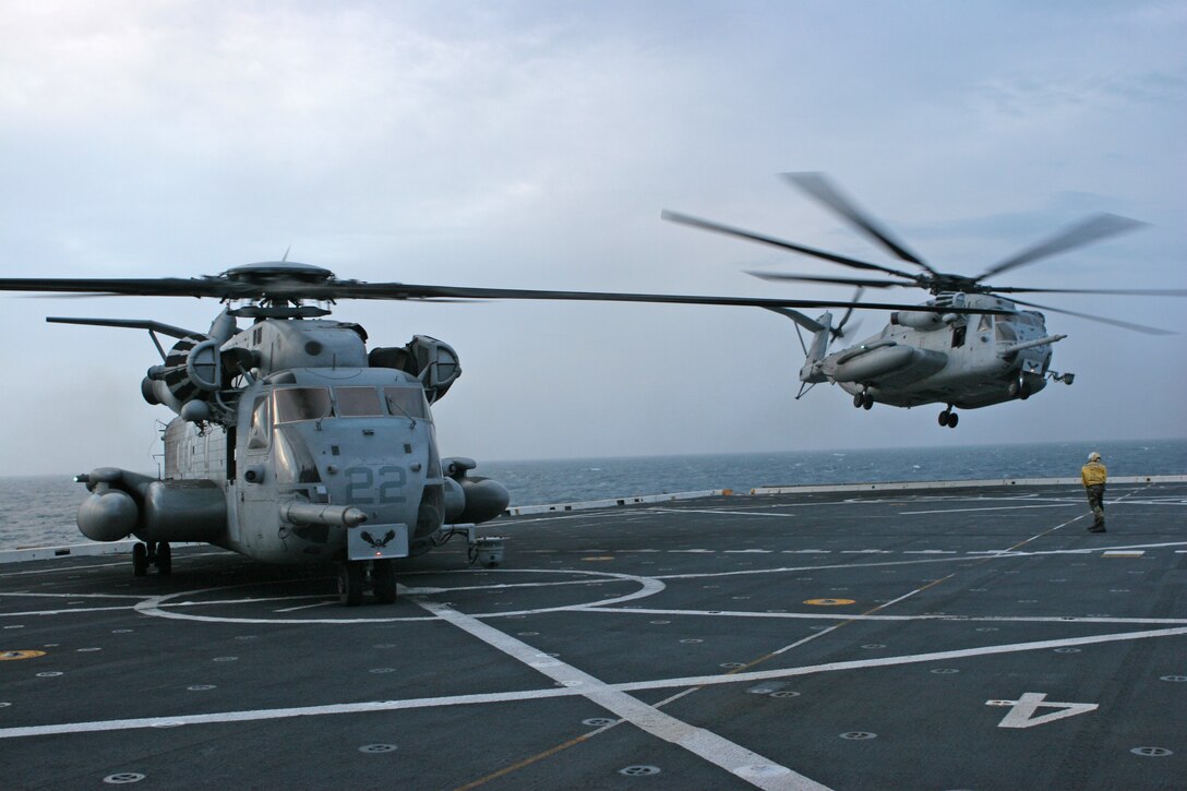 OFF THE COAST OF NORTH CAROLINA ABOARD USS SAN ANTONIO (March 3, 2008) – CH-53E helicopters from the 26th Marine Expeditionary Unit's Aviation Combat Element, Marine Medium Helicopter Squadron-264 (Rein) take off from the flight deck of the USS San Antonio, Tuesday, March 3, 2008, during the ship's Operational Evaluation.  (Official USMC photo by Cpl. Aaron J. Rock) (Released)