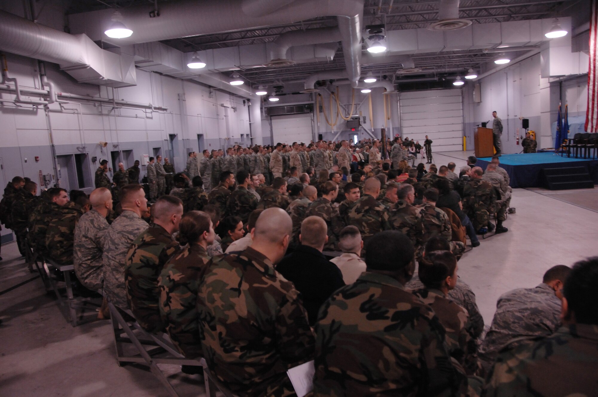 EIELSON AIR FORCE BASE, Alaska --- Airmen stand in formation at the Joint Mobility Complex for a homecoming held Feb. 29, 2008 to recognize all of Eielson's Airmen who returned from deployments overseas. (U.S. Air Force photo/Airman 1st Class Christopher Griffin)