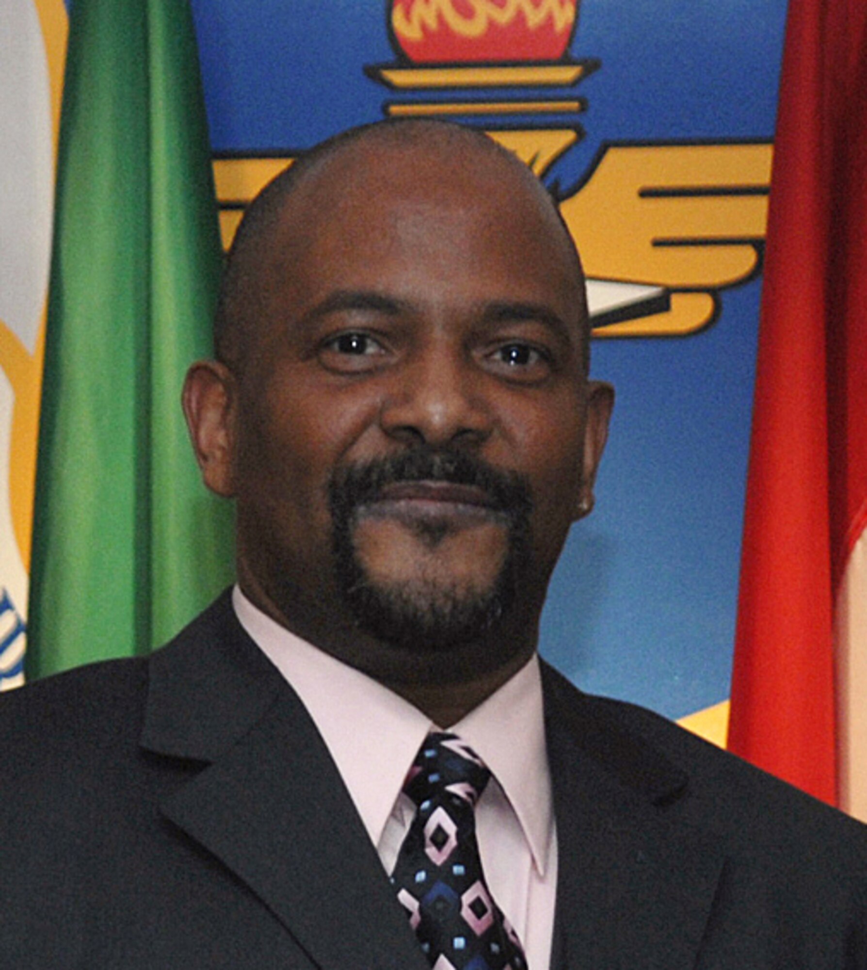 Glenn Cannonier is the 80th Flying Training Wing's Category III Civilian of the Year. Mr. Cannonier, a radar approach control, or RAPCON, controller at the 80th Operations Support Squadron, received the honor March 1 at the wing's Annual Awards Banquet. (U.S. Air Force photo/Lou Anne Sledge)