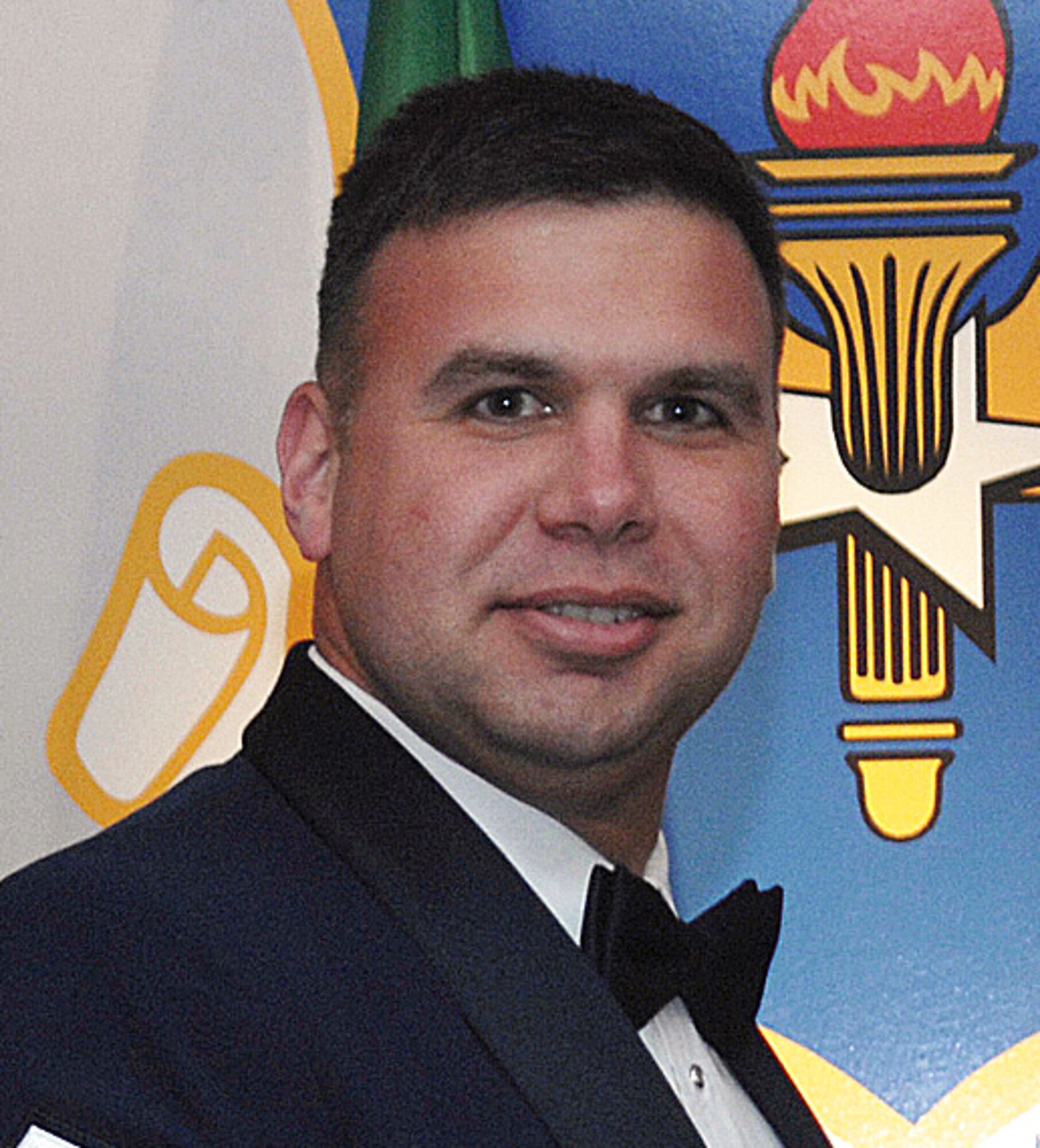 Master Sgt. Ricardo Young is the Senior NCO of the Year for the 80th Flying Training Wing. Sergeant Ricardo, a chief controller in the 80th Operations Support Squadron air traffic control tower, received the award March 1 during the wing's Annual Awards Banquet. (U.S. Air Force photo/Lou Anne Sledge)