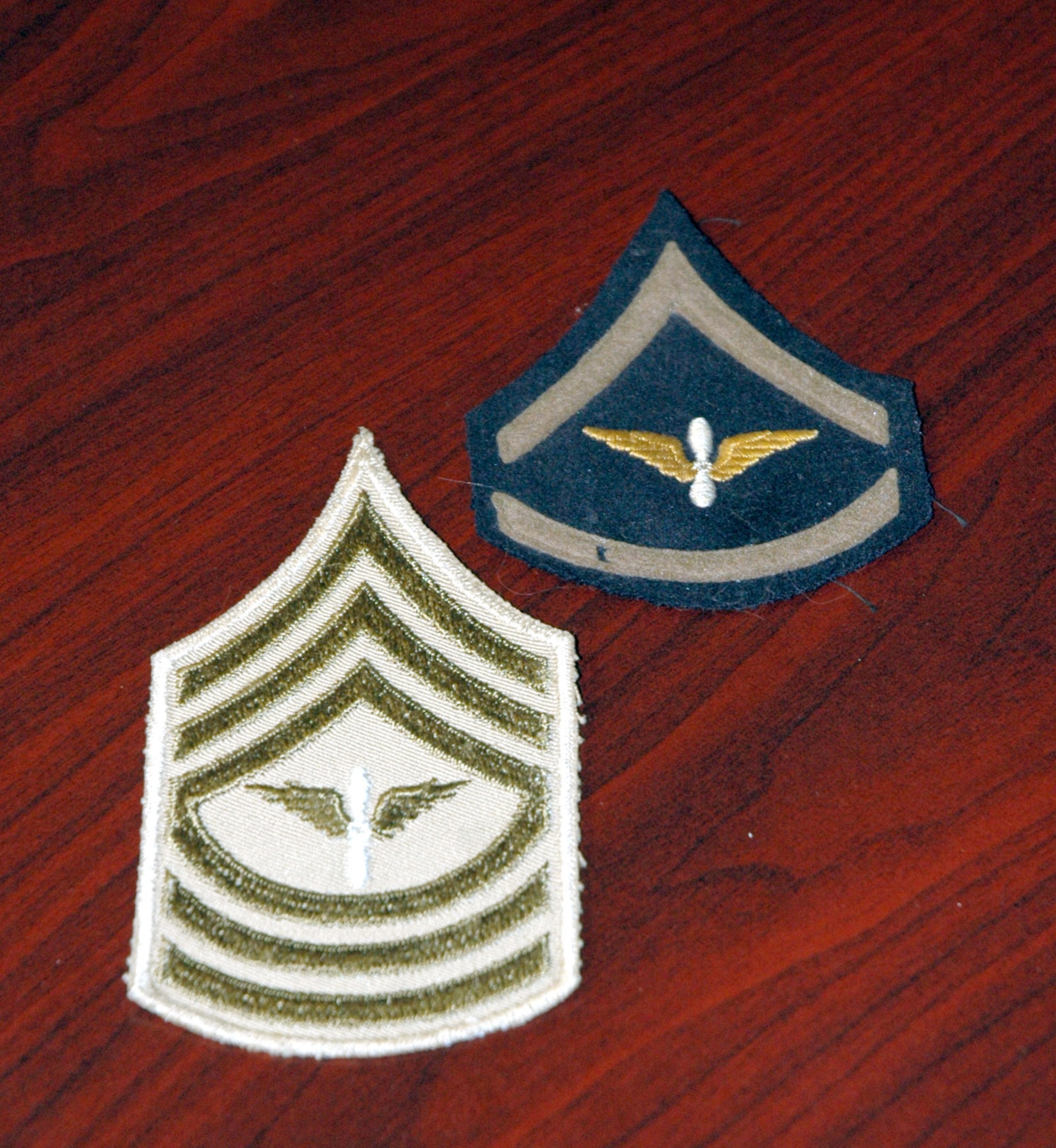 The Army and Army Air Corps had many unofficial chevrons and uniform patches worn by soldiers in wartime. Here are examples (left to right) from World War II and the 1930s. This collection belongs to Chief Master Sgt. Jerry Hanes, 341st Operations Group interim-superintendent, who has an extensive military memorabilia collection ranging from uniforms, patches, collar brass, framed photos and documents to name a few. He has been collecting for 35 years. (U.S. Air Force photo/Senior Airman Eydie Sakura)