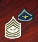 The Army and Army Air Corps had many unofficial chevrons and uniform patches worn by soldiers in wartime. Here are examples (left to right) from World War II and the 1930s. This collection belongs to Chief Master Sgt. Jerry Hanes, 341st Operations Group interim-superintendent, who has an extensive military memorabilia collection ranging from uniforms, patches, collar brass, framed photos and documents to name a few. He has been collecting for 35 years. (U.S. Air Force photo/Senior Airman Eydie Sakura)