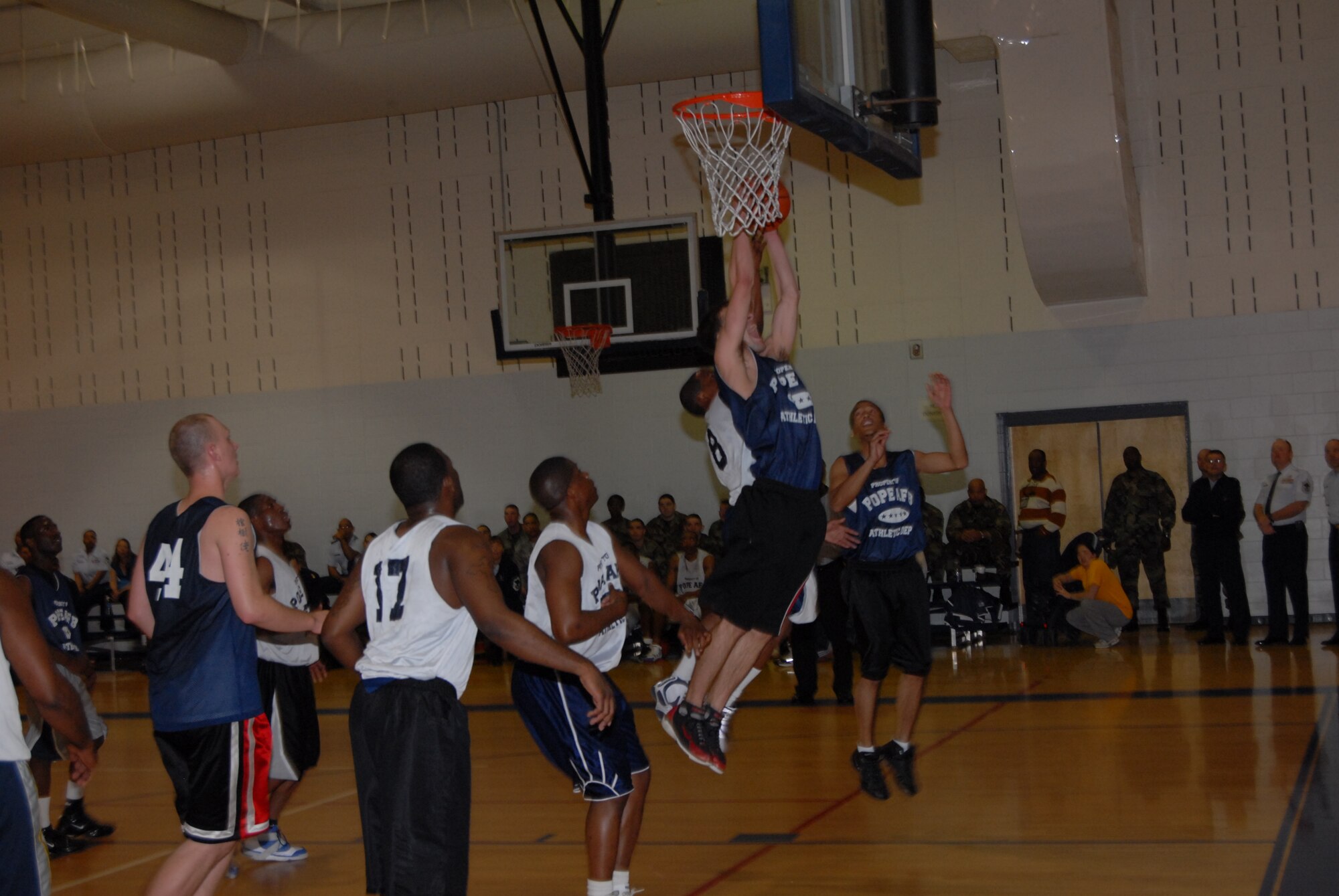 Jared Bourgeois, 43rd Mission Support Squadron, grabs a rebound during the championship game against 43rd Logistics Readiness Squadron March 3. (U.S. Air Force Photo by 2nd Lt. Chris Hoyler)