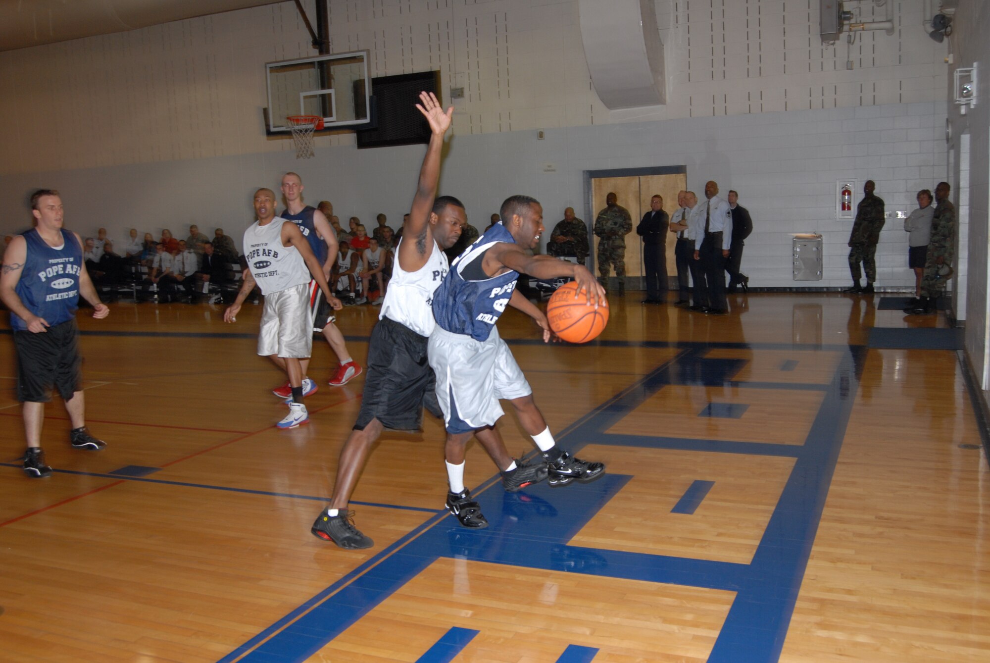 Irvin Gourdine, 43rd Mission Support Squadron, attempts to save the ball from going out of bounds during the championship game against 43rd Logistics Readiness Squadron March 3. 