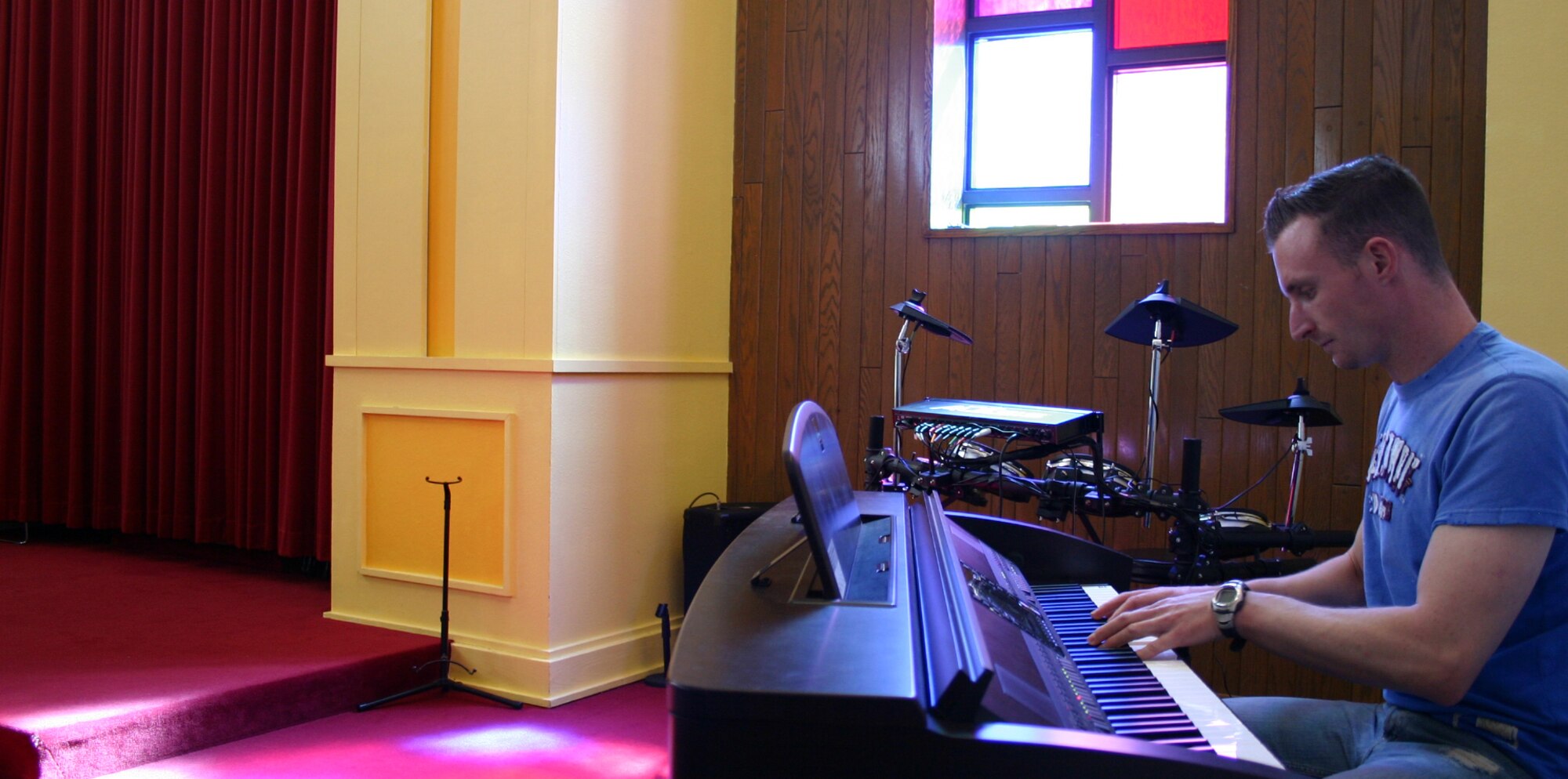 CANNON AIR FORCE BASE, N.M. - Senior Airman Mark Maddon, 27th Special Operations Security Forces Squadron, practices on the piano at the Base Chapel during some time off Feb. 29. Airman Maddon has been selected to play with the Air Force's Tops in Blue during their 2008 world tour. (U.S. Air Force photo by Airman 1st Class Elliott Sprehe)