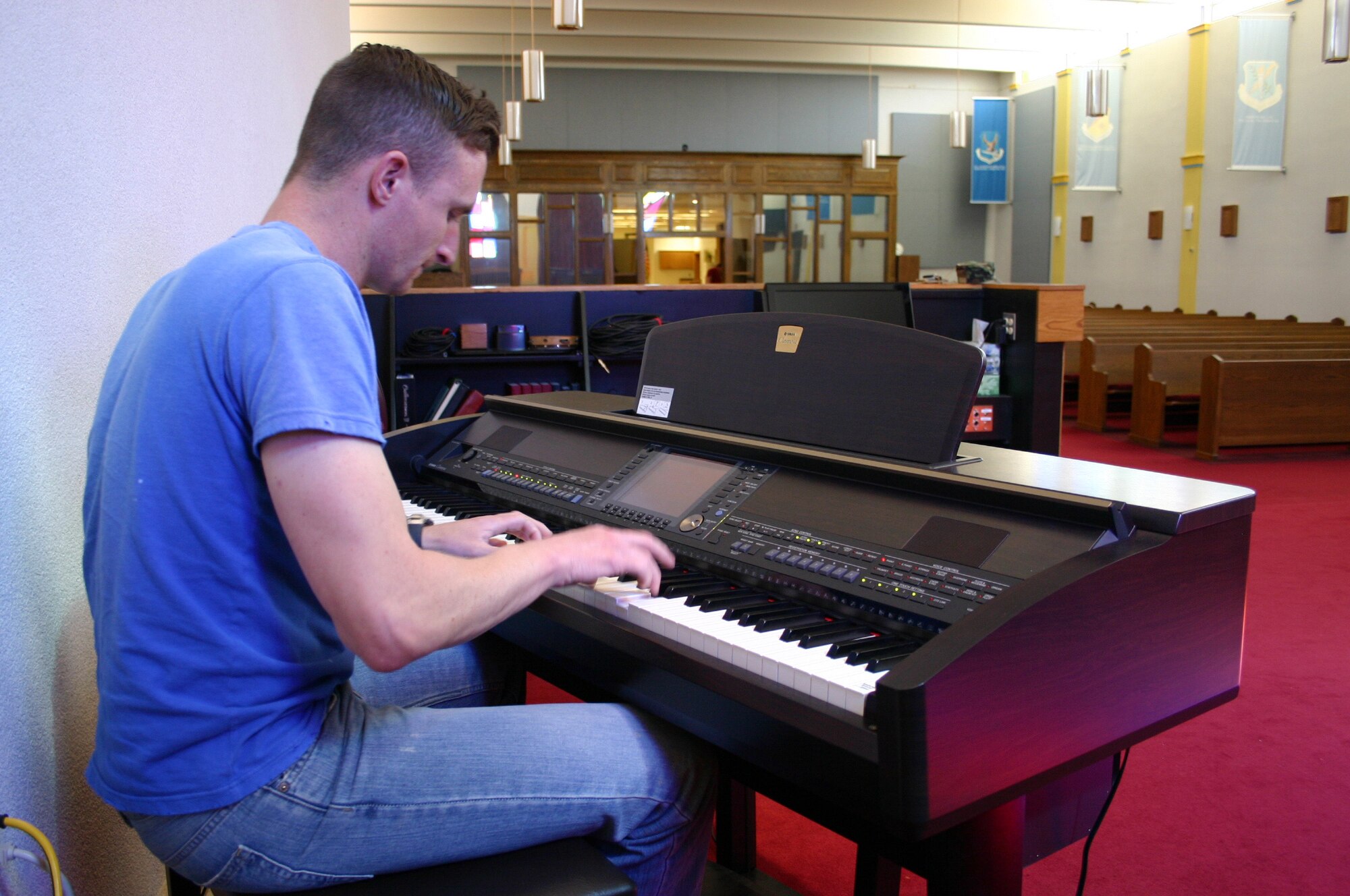 CANNON AIR FORCE BASE, N.M. - Senior Airman Mark Maddon, 27th Special Operations Security Forces Squadron, takes some time out of his day to play the piano at the Base Chapel Feb. 29. Airman Maddon has been selected to play with the Air Force's Tops in Blue during their 2008 world tour. (U.S. Air Force photo by Airman 1st Class Elliott Sprehe)