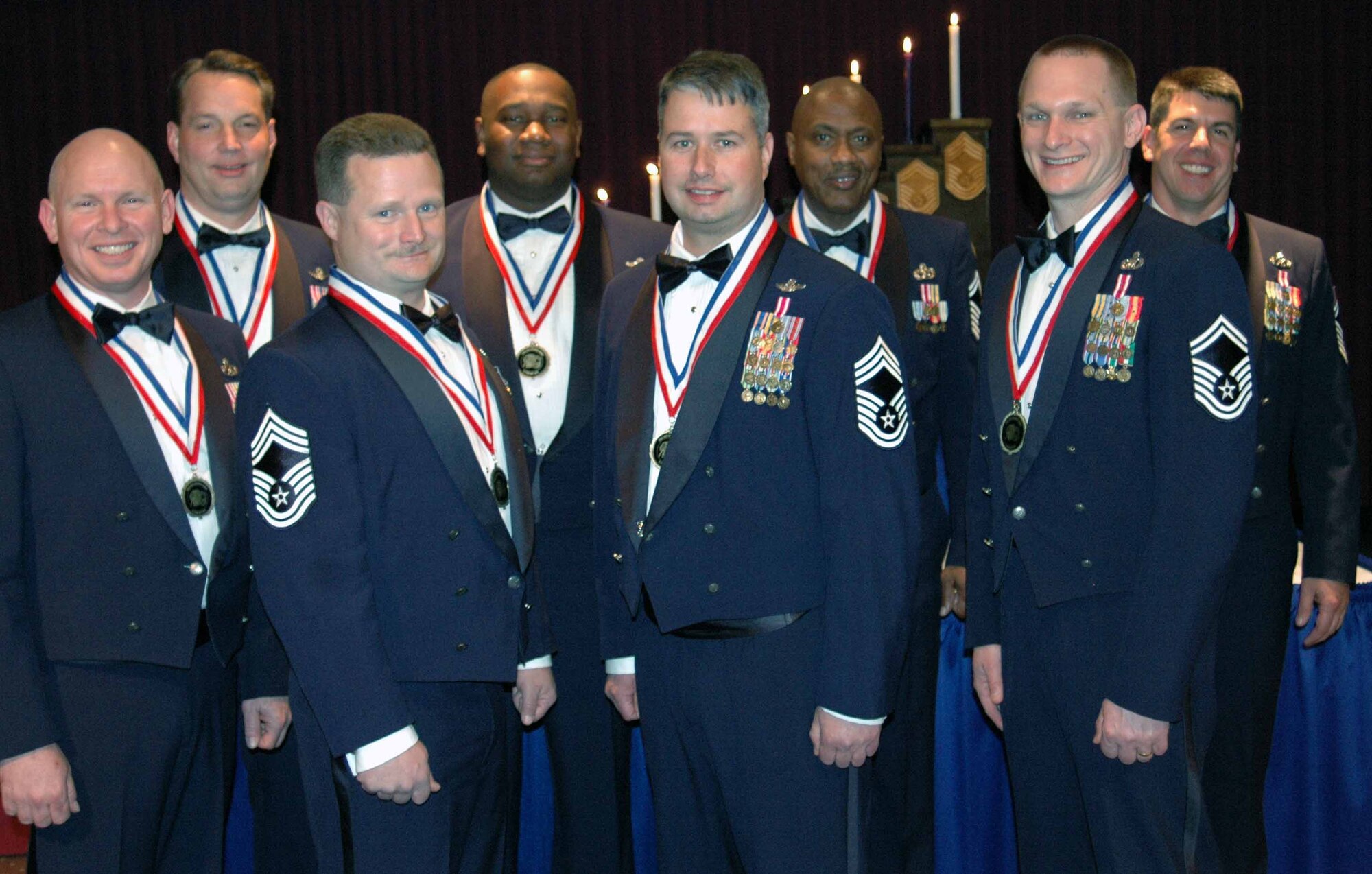 Being formally recognized as Tinker’s newest chief master sergeants during a recognition ceremony Feb. 22 at the Tinker Club are: from left, Senior Master Sgt. John Jasper, 552nd Maintenance Squadron; Senior Master Sgt. Leslie Doncaster, 966th Airborne Air Control Squadron; Chief Master Sgt. Carl Butler, 513th Air Control Group; Chief Master Sgt. Lamond Tate, 513th Air Control Group; Chief Master Sgt. Phillip Brand, 507th Air Refueling Wing; Senior Master Sgt. Nathaniel McGuire, 72nd Aerial Port Squadron; Senior Master Sgt. Gregory Amelsberg, 552nd MXS; and Senior Master Sgt. John Martin, 552nd MXS.  (Air Forcer photo by Darren D. Heusel)