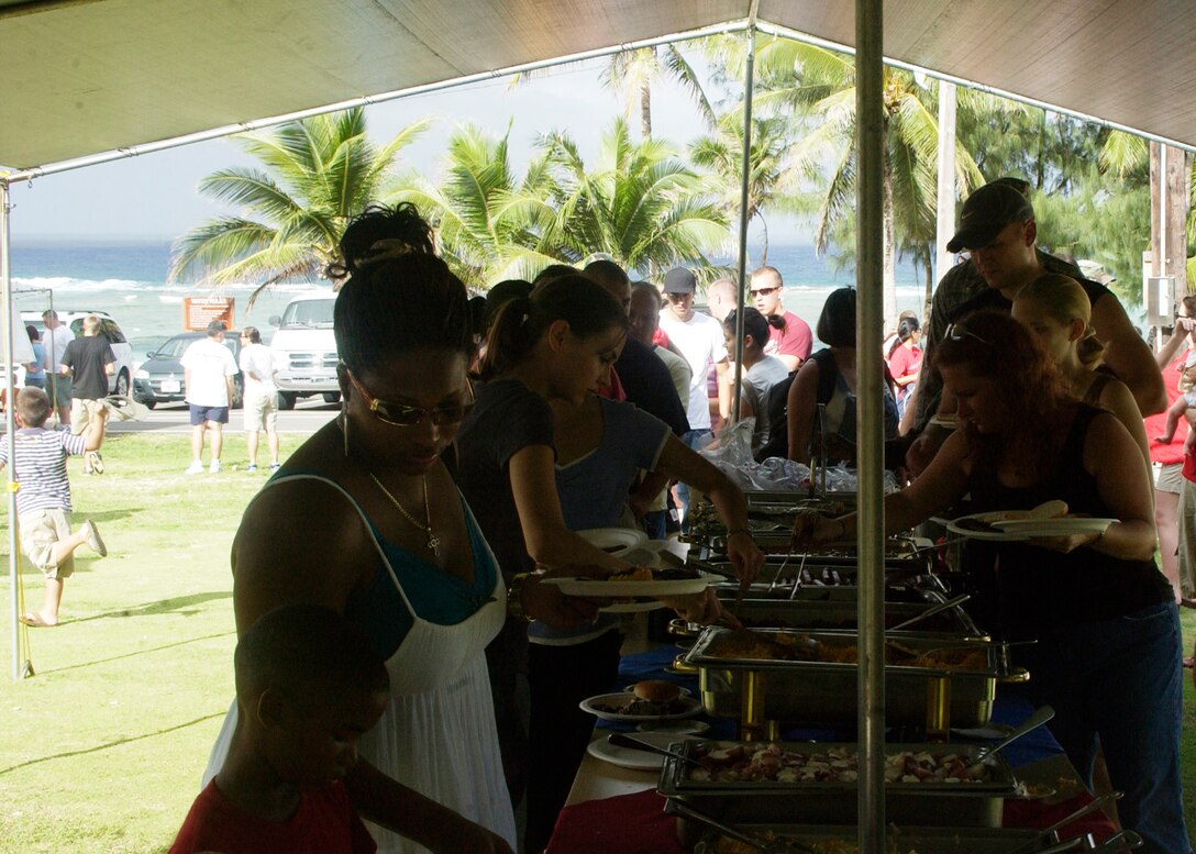 ANDERSEN AFB, Guam - Team Andersen members line up for food provided by the 36th Services Squadron. (U.S. Air force photo by Airman 1st Class Zachary Hunter)